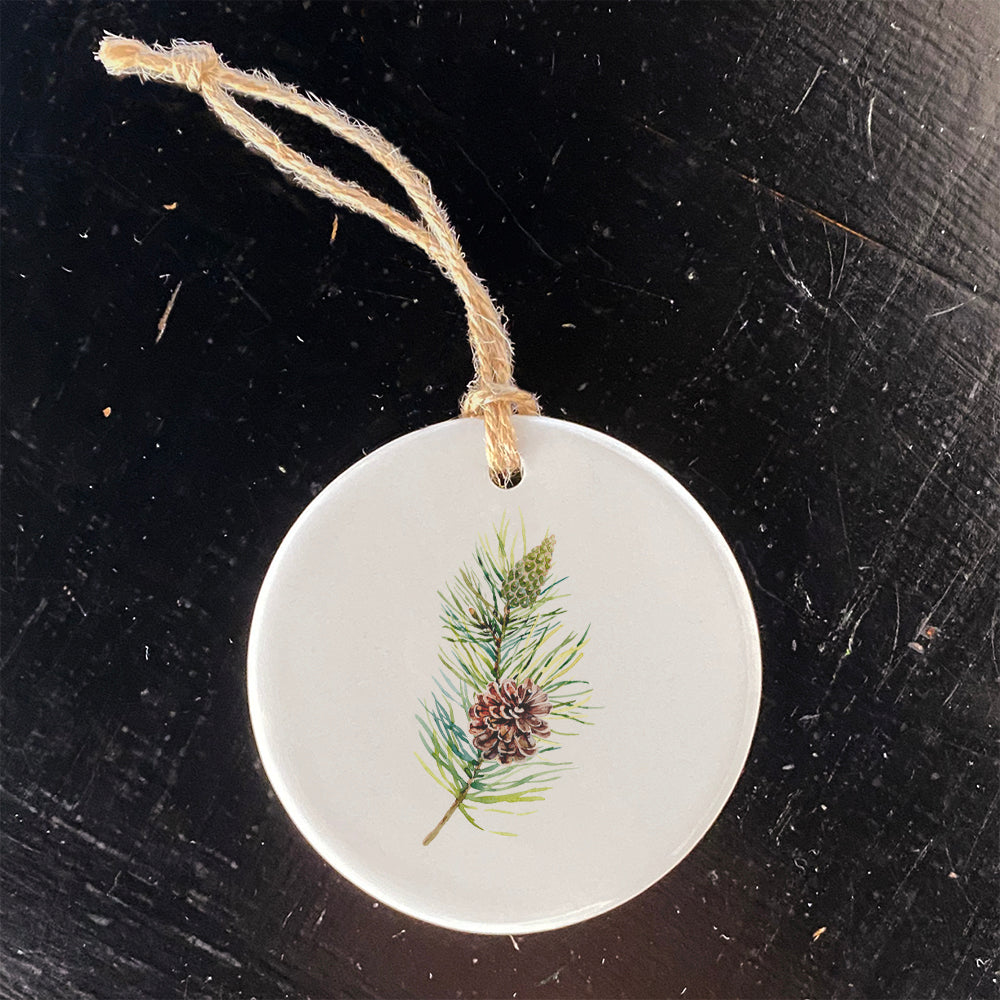 A beautifully crafted Pine Branch Ornament made of high-quality porcelain, featuring a vibrant design and smooth gloss finish.