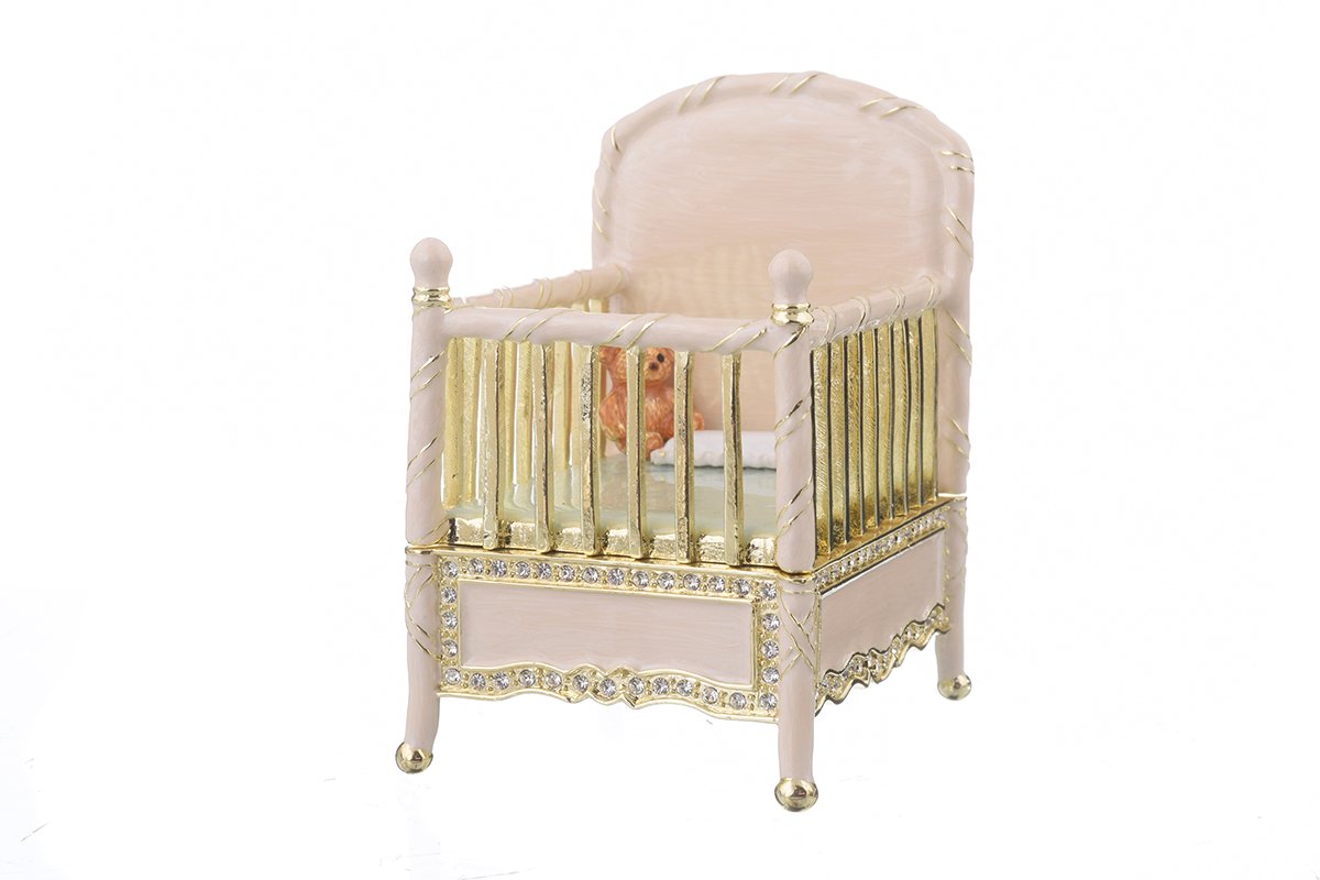 A beautifully crafted Pink Baby Bed trinket box, handmade with enamel and adorned with sparkling Austrian crystals, featuring a luxurious gold or silver plating.