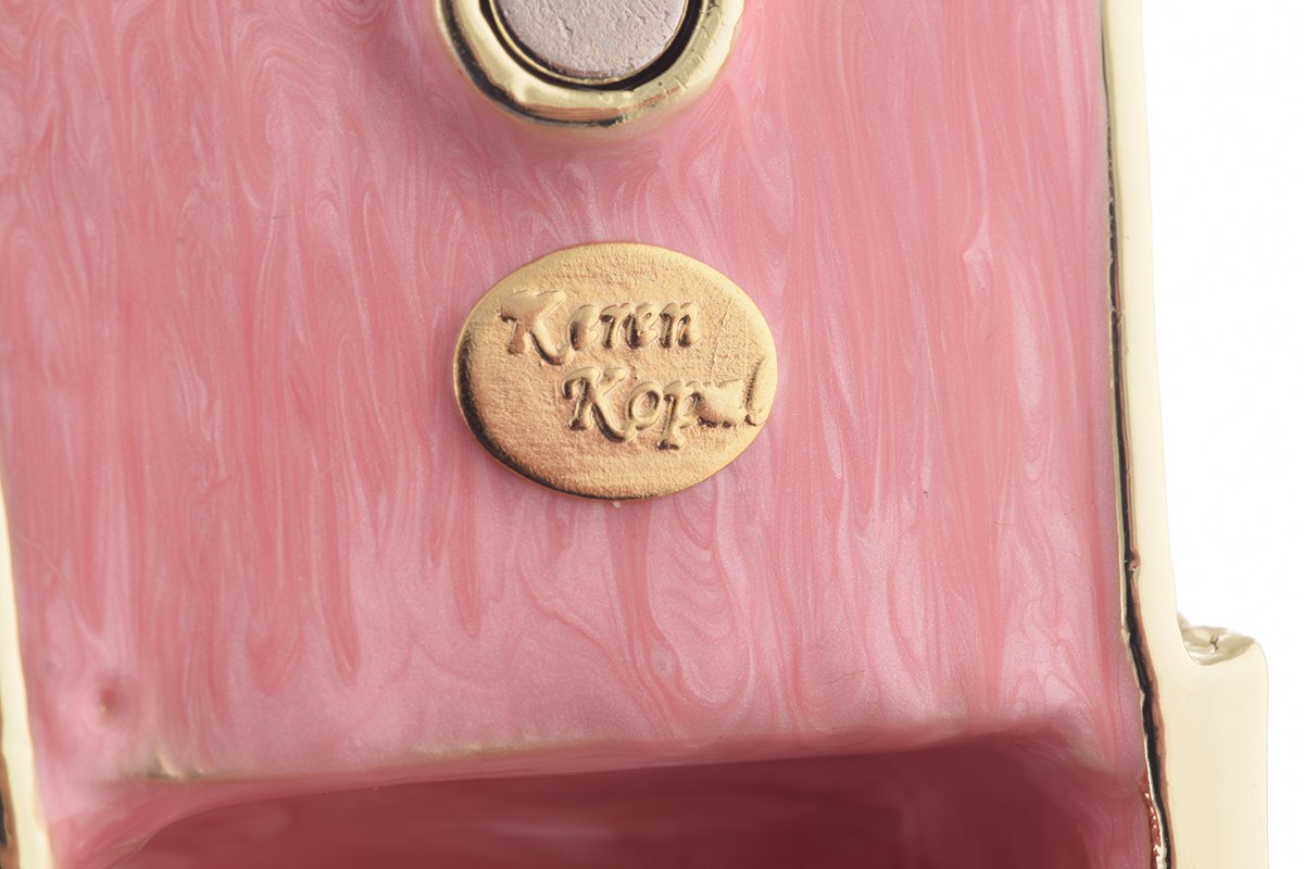 A beautifully handcrafted Pink Baby Carriage trinket box adorned with Austrian crystals and plated with 24K gold, showcasing intricate details.