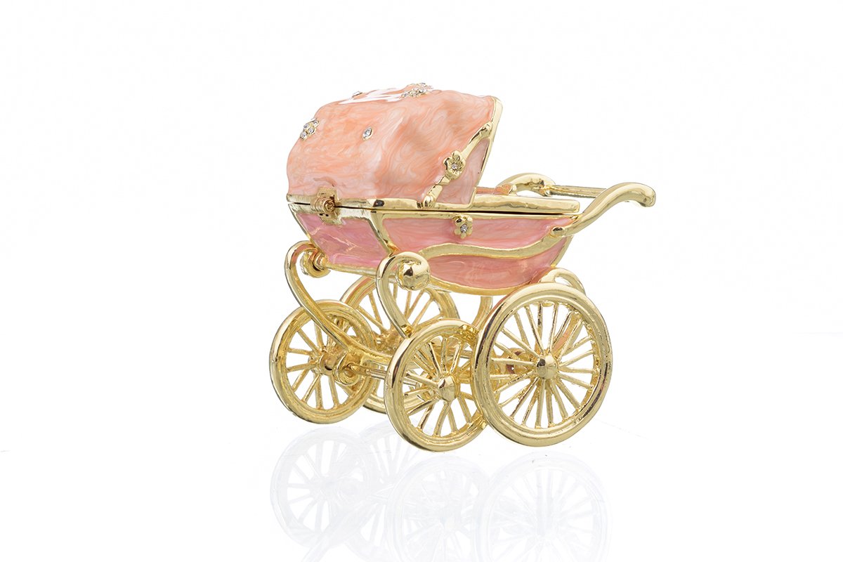 A beautifully handcrafted Pink Baby Carriage trinket box adorned with Austrian crystals and plated with 24K gold, showcasing intricate details.