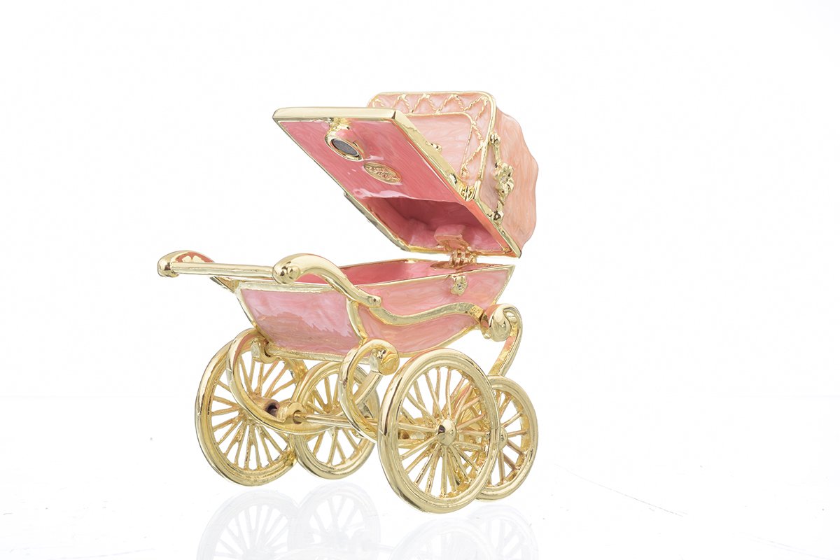 A beautifully handcrafted Pink Baby Carriage trinket box adorned with Austrian crystals and plated with 24K gold, showcasing intricate details.