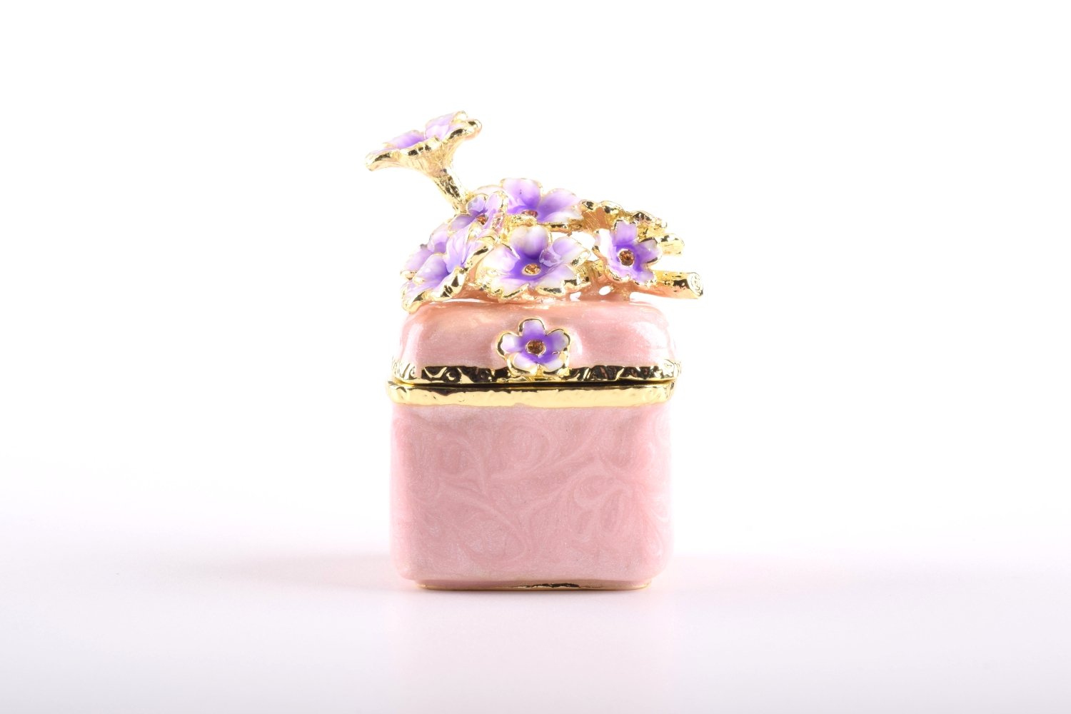 A beautiful pink enamel trinket box adorned with sparkling Austrian crystals and plated with 24K gold, showcasing exquisite craftsmanship.