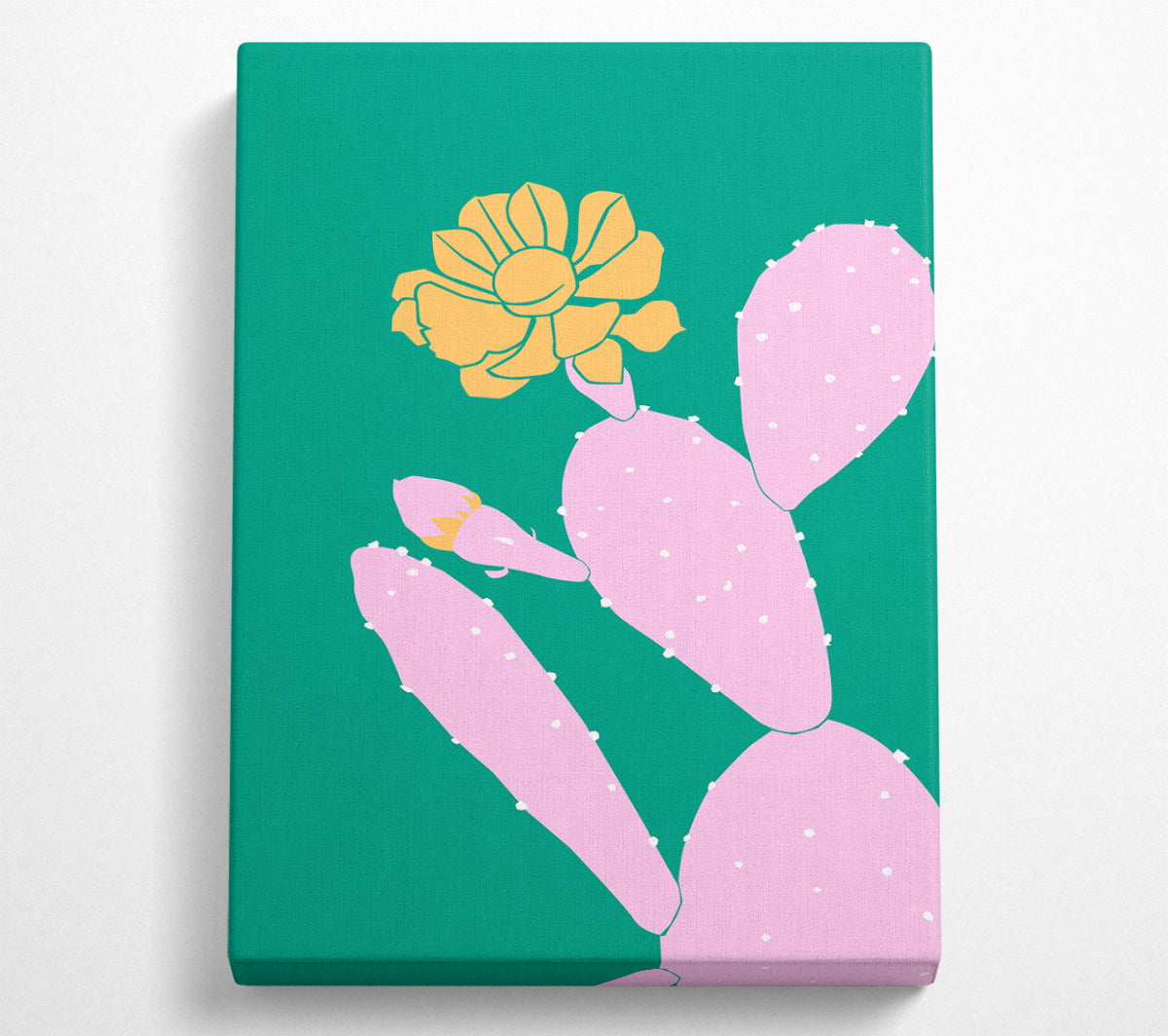 A vibrant pink cactus adorned with a bright yellow flower, printed on canvas and mounted on a box frame, ready to hang.