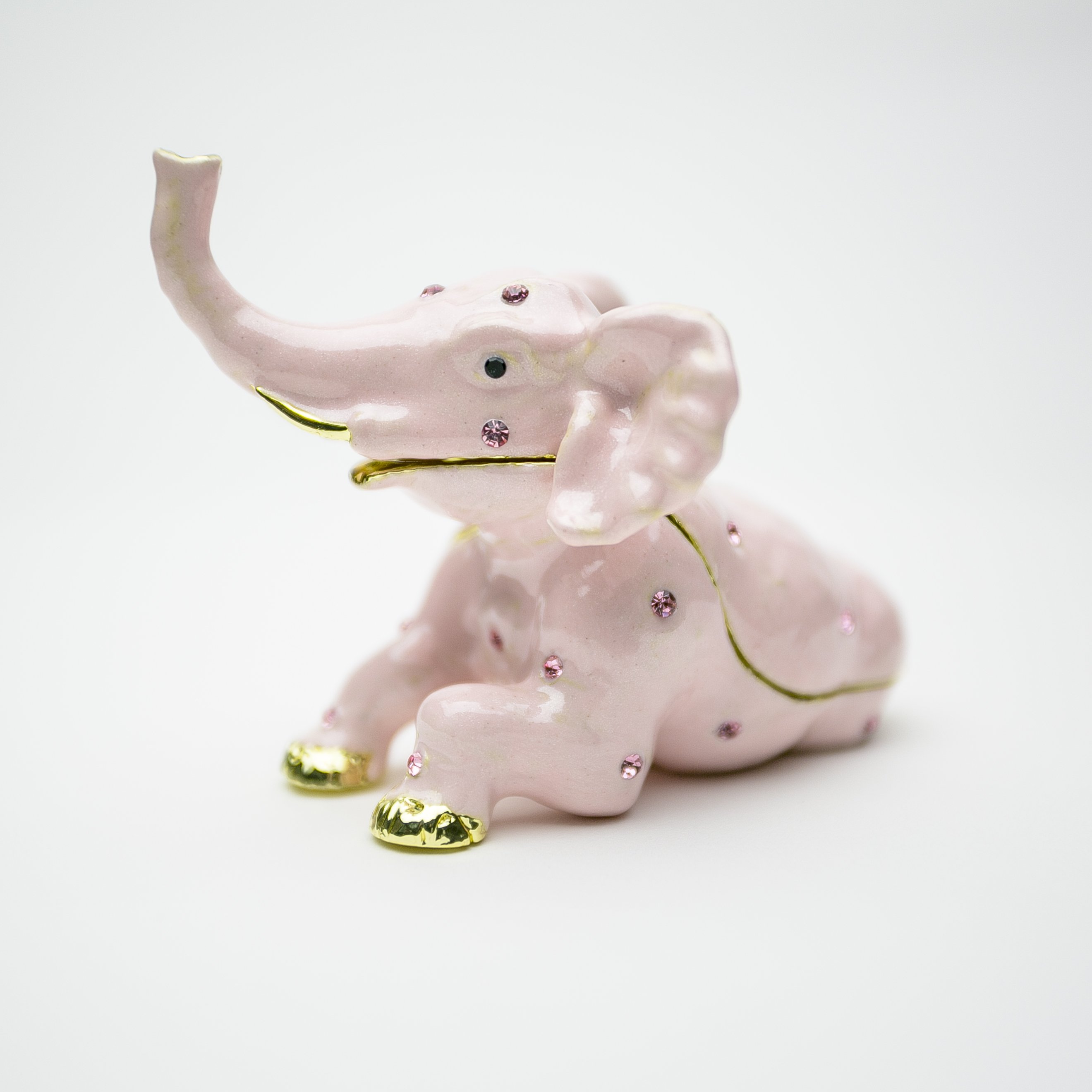 Handcrafted Pink Elephant trinket box adorned with Austrian crystals and plated in 24K gold, showcasing intricate details and vibrant colors.