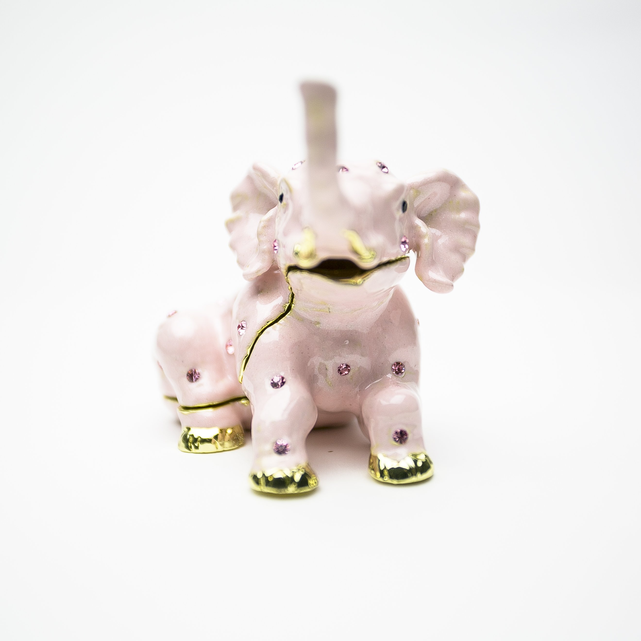 Handcrafted Pink Elephant trinket box adorned with Austrian crystals and plated in 24K gold, showcasing intricate details and vibrant colors.