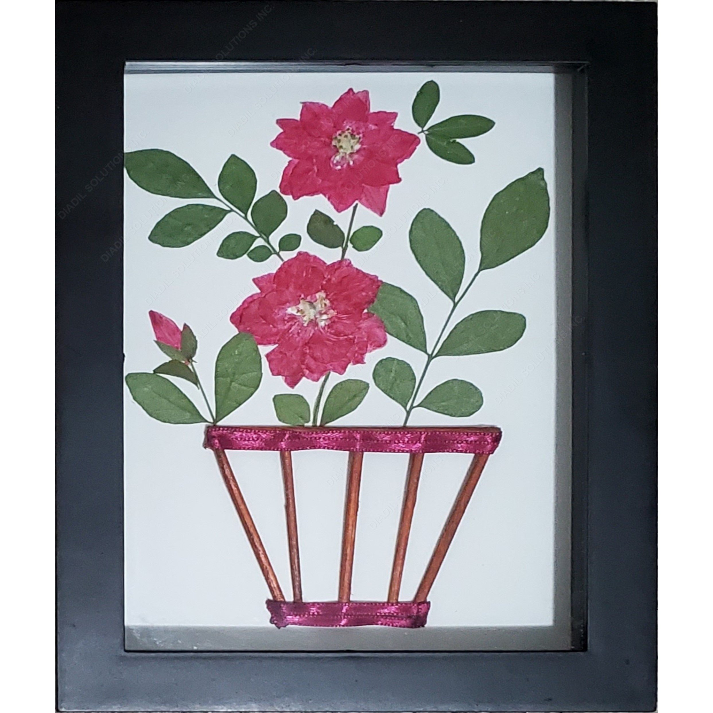 A beautifully framed Pink Flower Herbarium showcasing pressed pink flowers, perfect for wall decor.