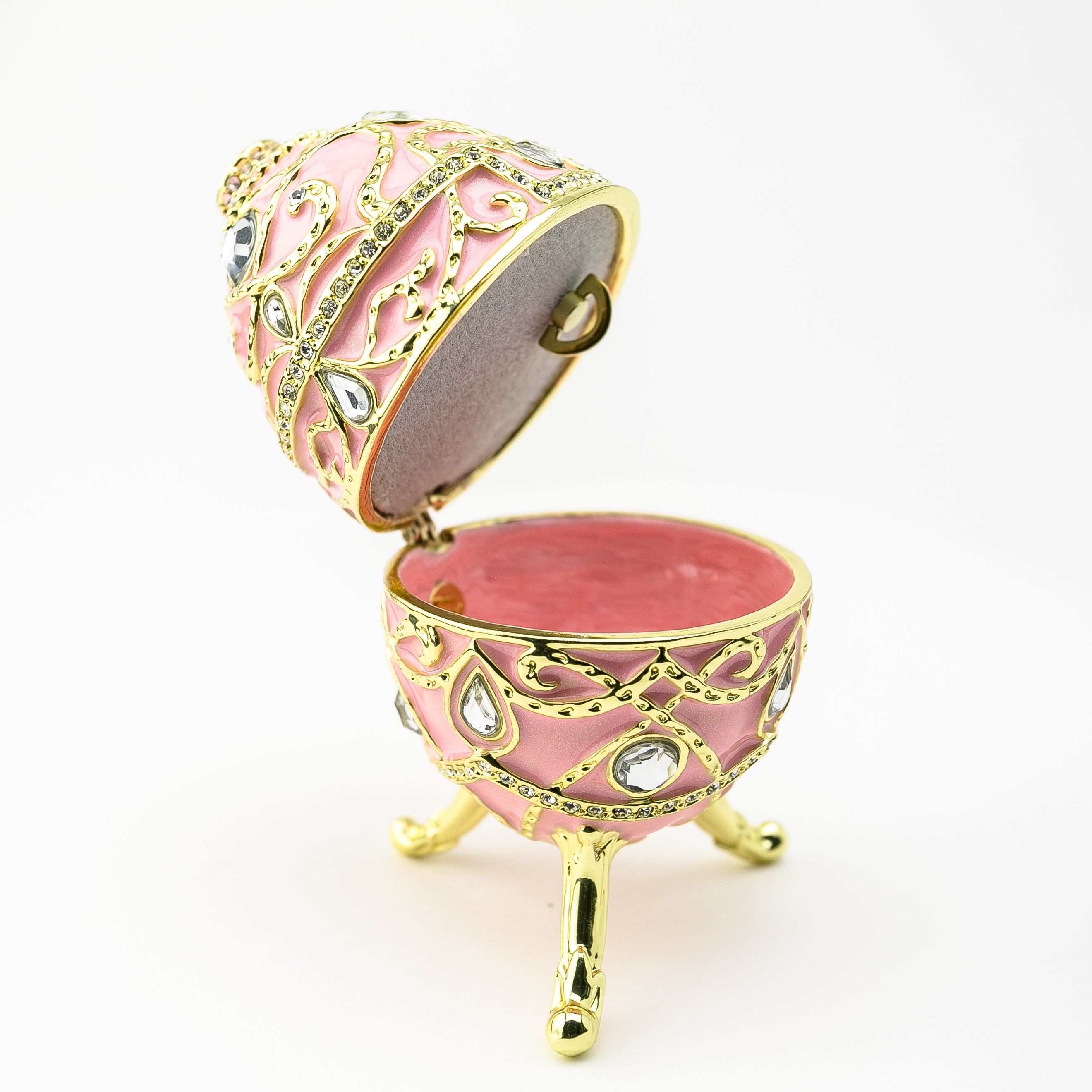 A beautifully crafted Pink Music Playing Russian Egg trinket box adorned with Austrian crystals and plated with 24K gold, showcasing intricate details.