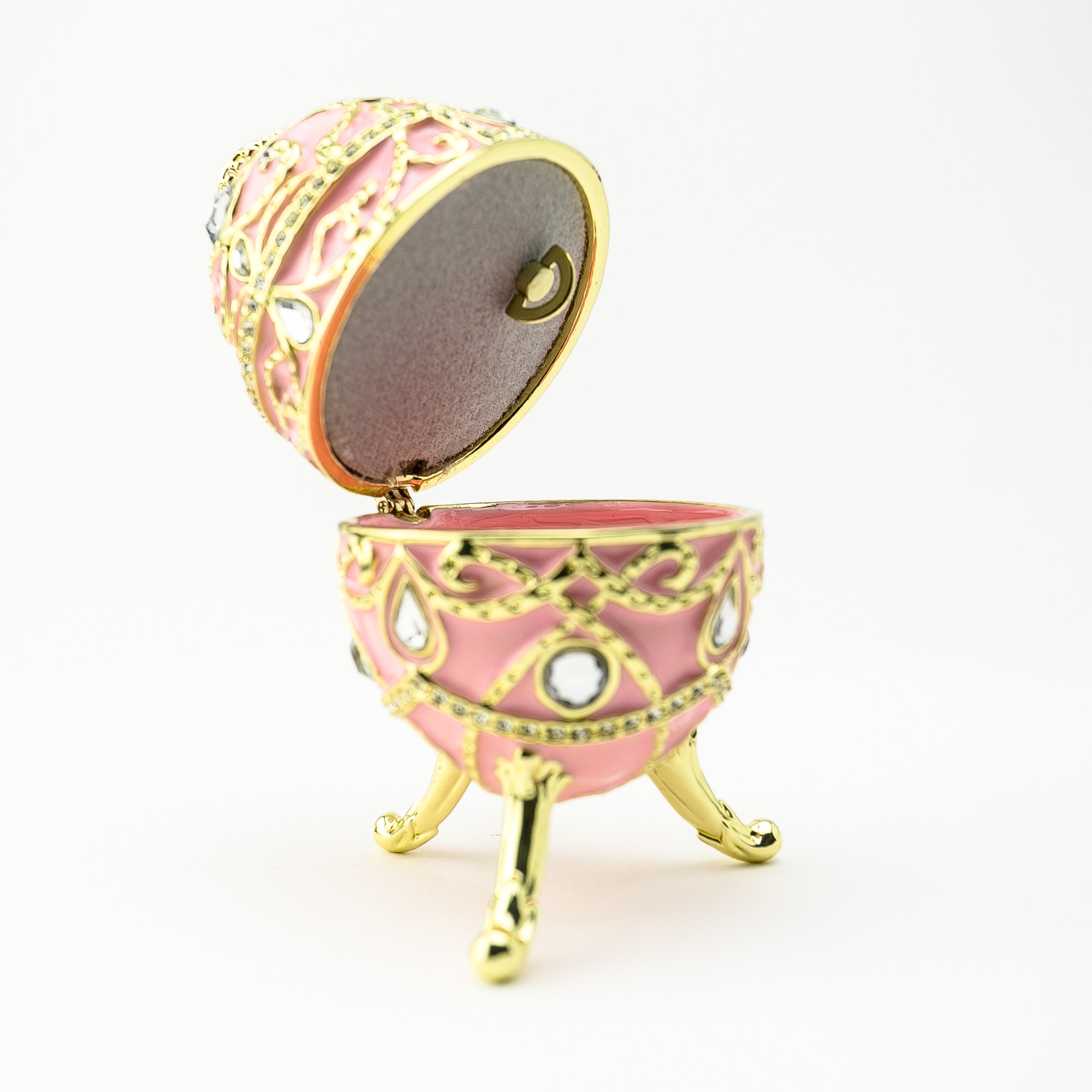 A beautifully crafted Pink Music Playing Russian Egg trinket box adorned with Austrian crystals and plated with 24K gold, showcasing intricate details.