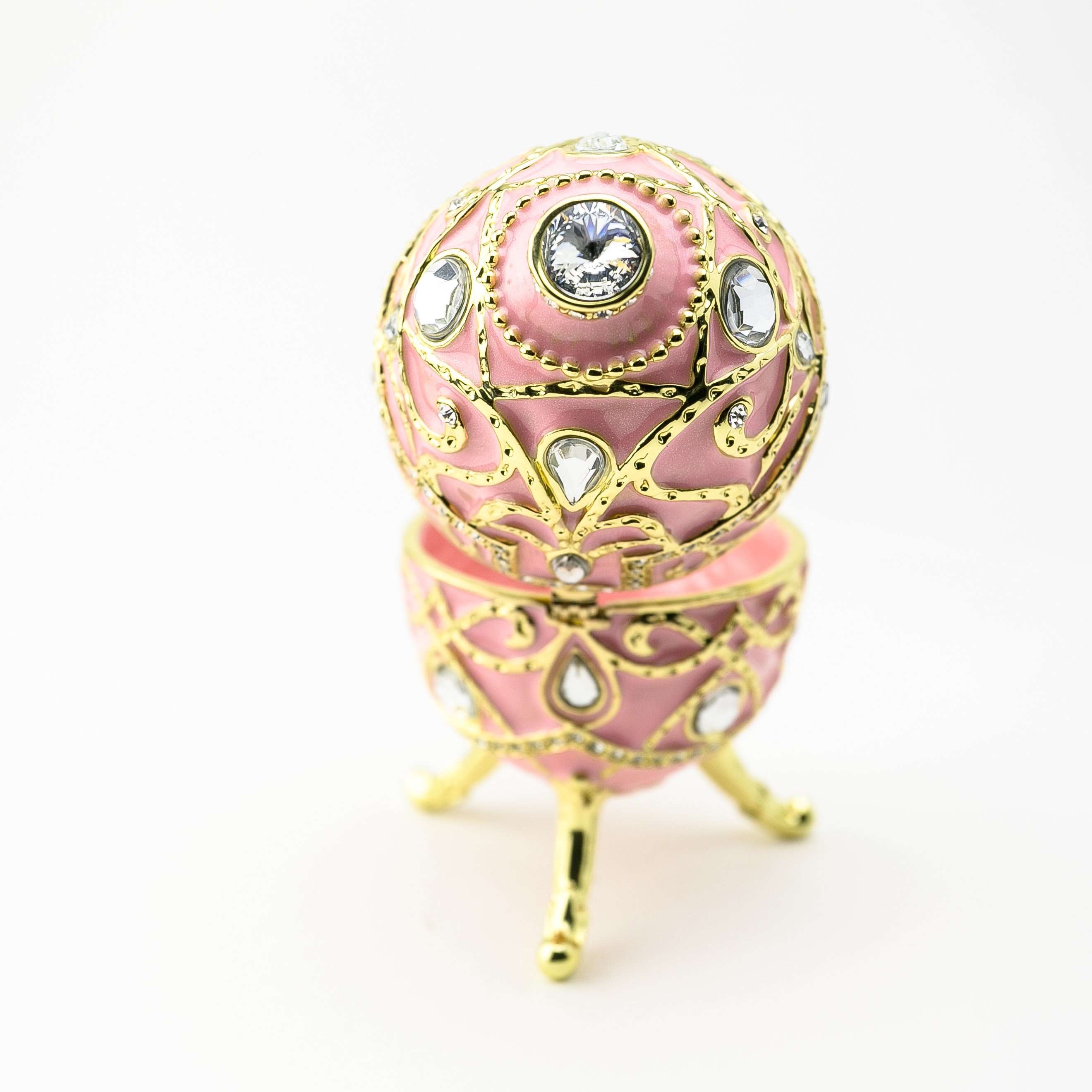 A beautifully crafted Pink Music Playing Russian Egg trinket box adorned with Austrian crystals and plated with 24K gold, showcasing intricate details.