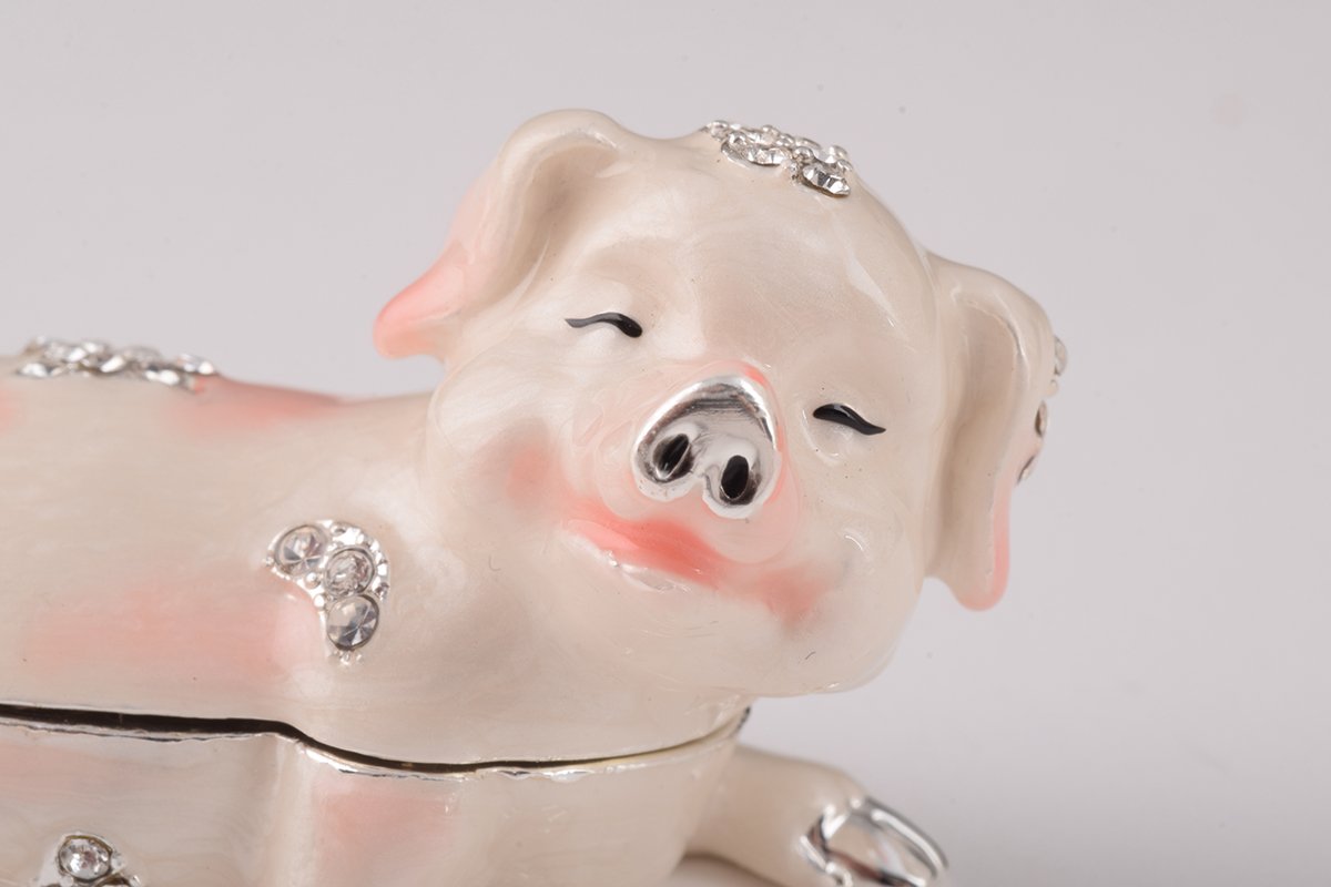 Handcrafted Pink Pig trinket box adorned with Austrian crystals and 24K gold plating, showcasing intricate details and a secure magnetic closure.