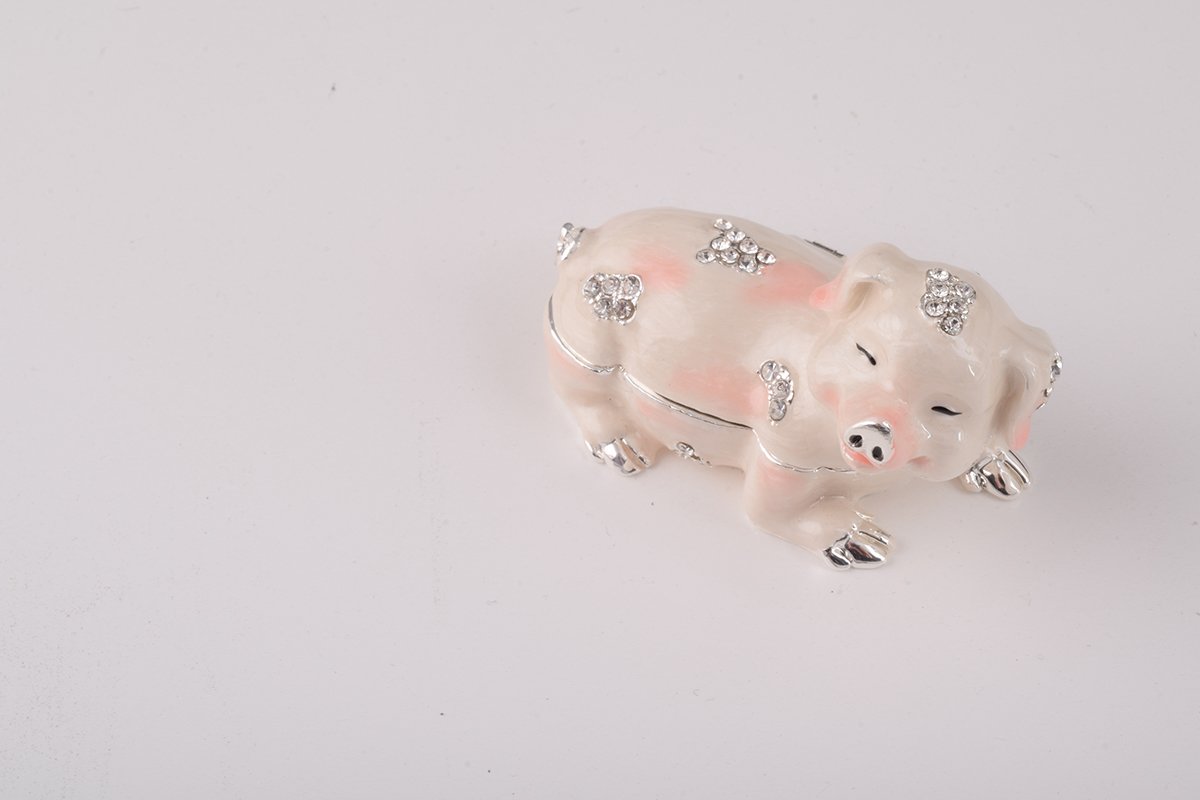 Handcrafted Pink Pig trinket box adorned with Austrian crystals and 24K gold plating, showcasing intricate details and a secure magnetic closure.