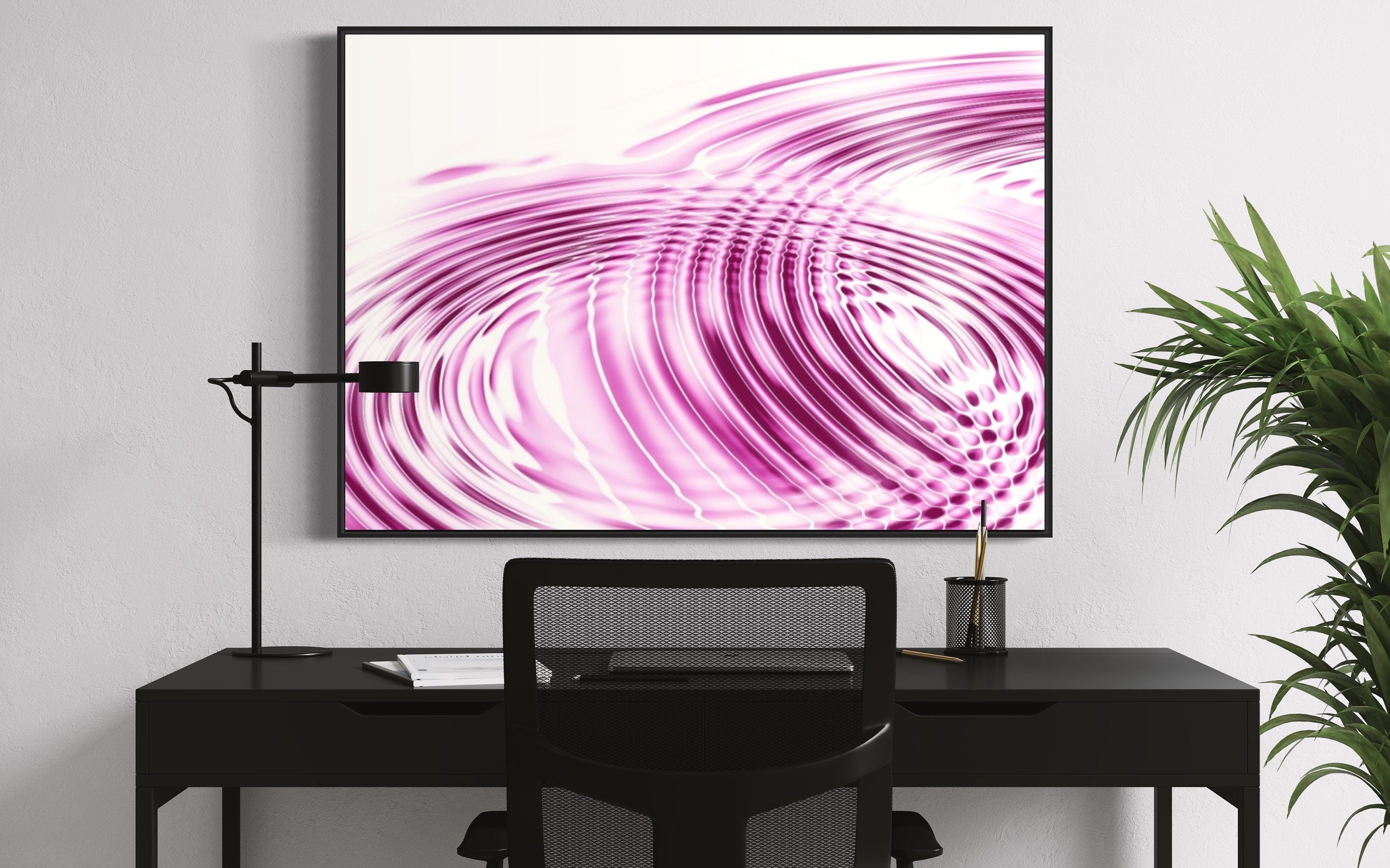 A beautiful print of pink and white ripples created by water droplets, evoking tranquility and serenity.