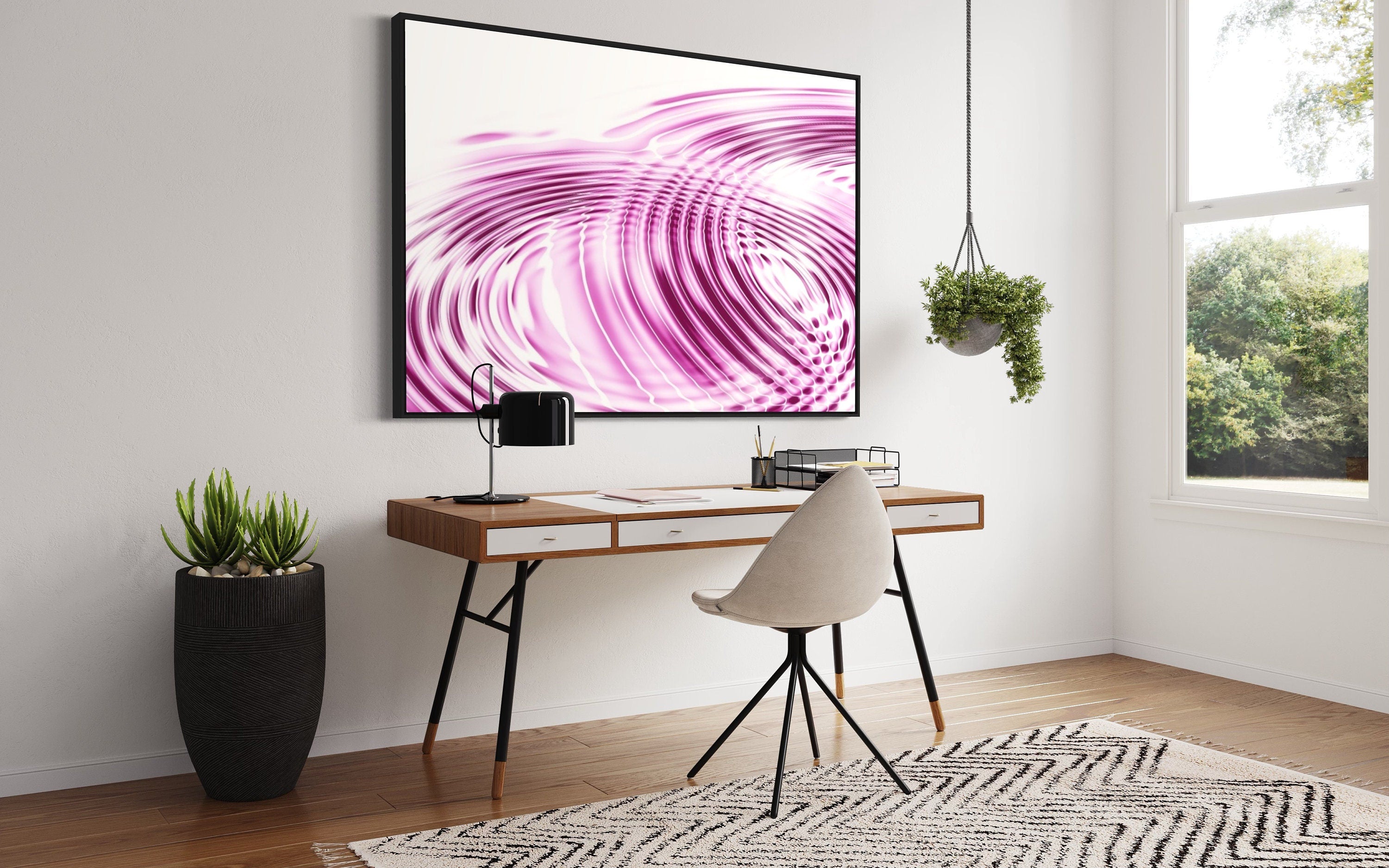 A beautiful print of pink and white ripples created by water droplets, evoking tranquility and serenity.