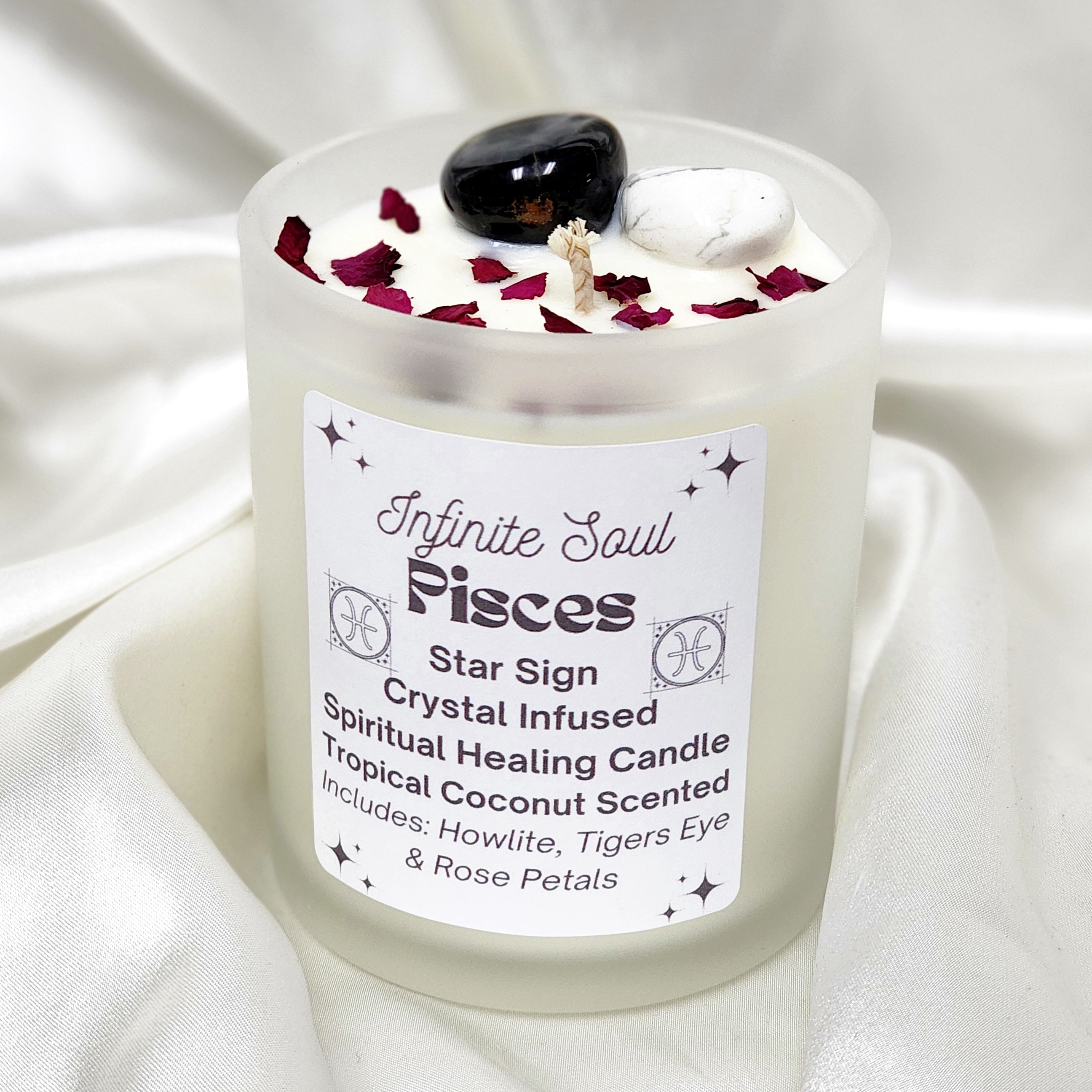 Pisces Star Sign Crystal Infused Candle with tropical coconut scent, featuring Howlite and Tigers Eye crystals, in a clear or frosted jar.