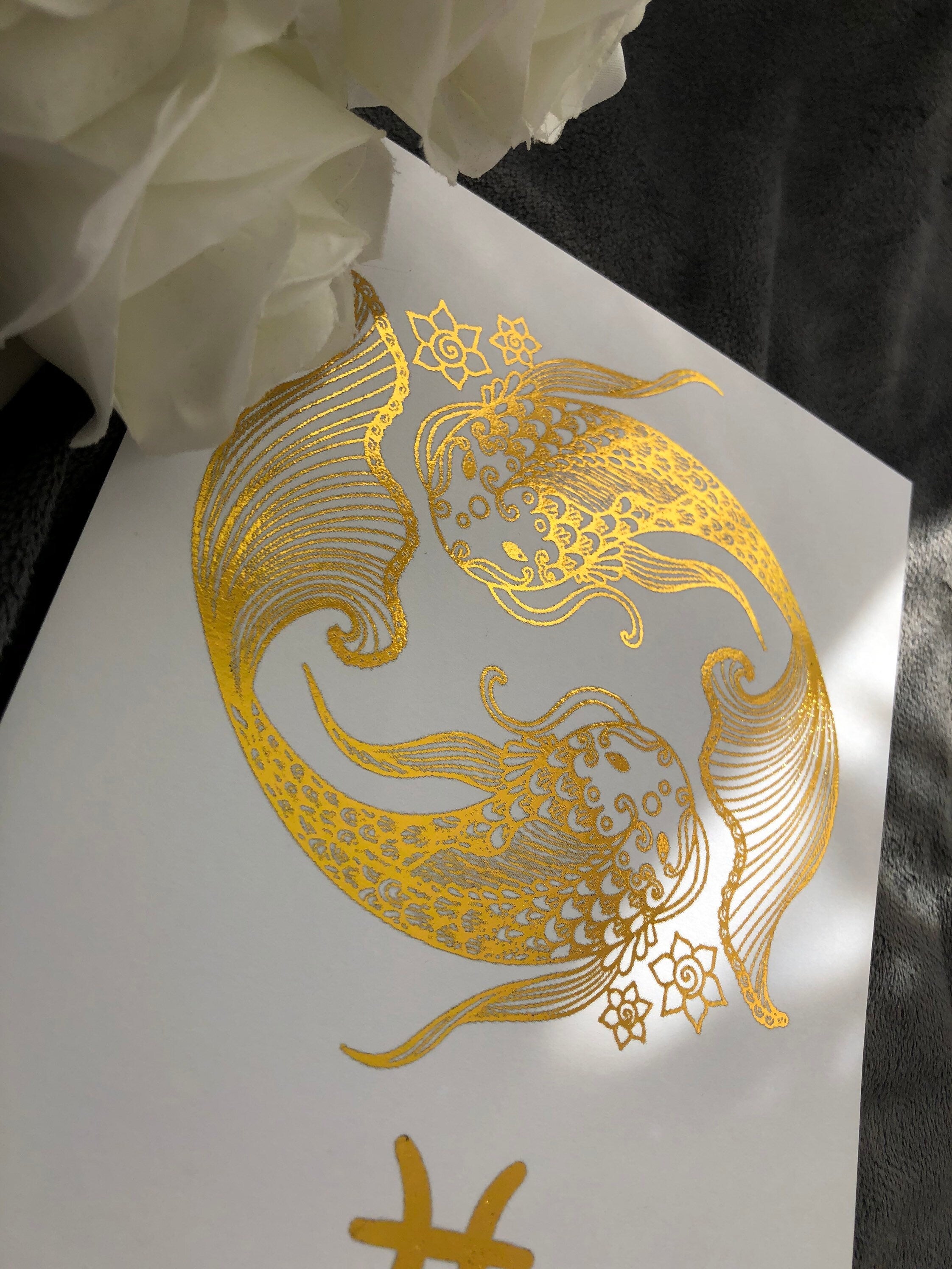 Pisces Star Sign Foil Print featuring two fish symbolizing the zodiac sign, elegantly designed with shimmering foil.