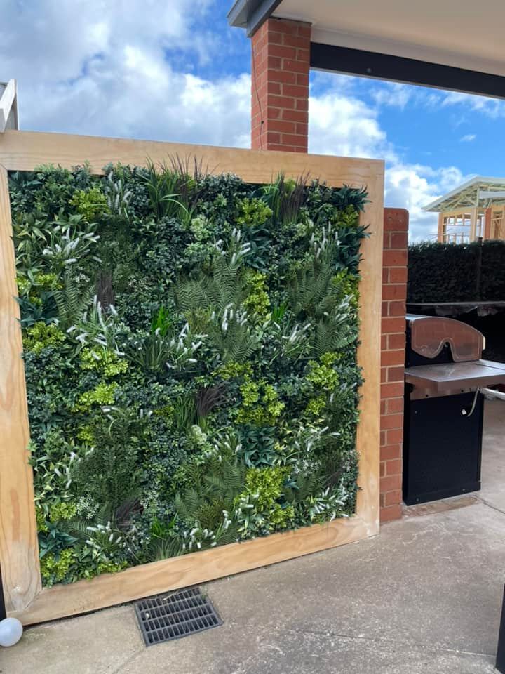 Platinum Garden of Eden Artificial Vertical Garden showcasing lush, realistic foliage on a sturdy metal backing, perfect for indoor and outdoor decor.