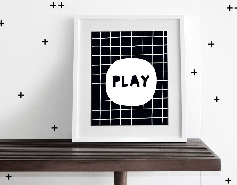 Stylish Play Wall Art featuring modern design for nursery decor, framed with a white matte.