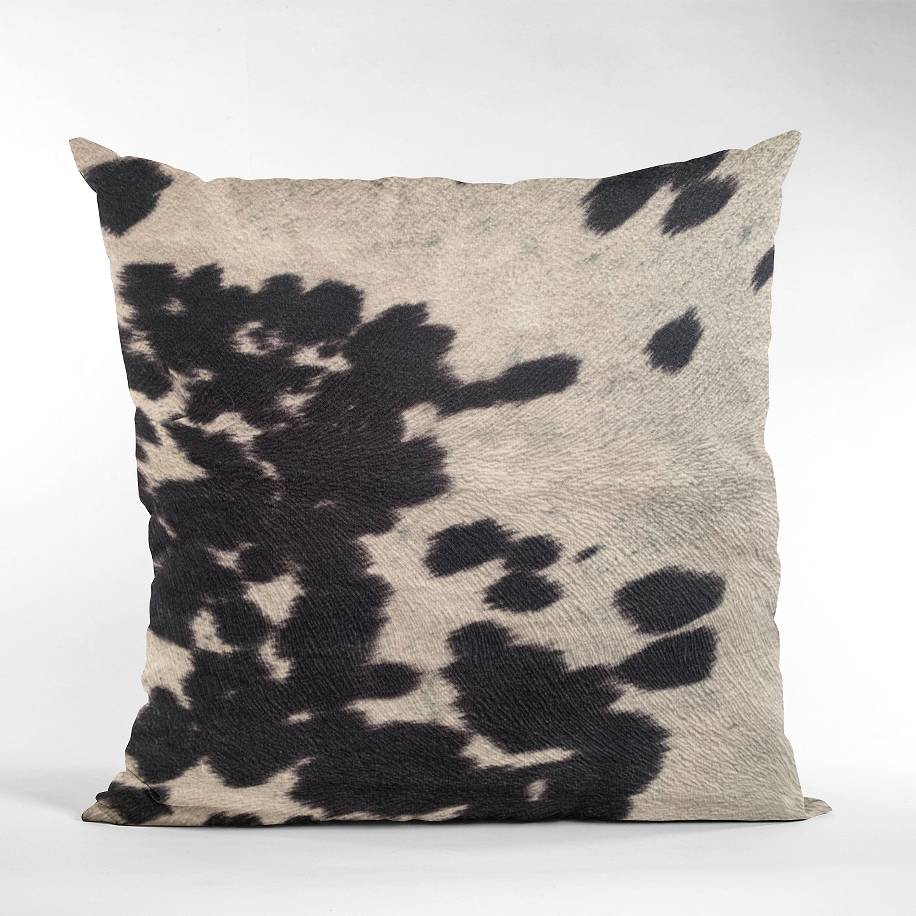 Plutus Black Cowhide Animal Luxury Throw Pillow featuring a sleek black design with a soft texture, perfect for home decor.