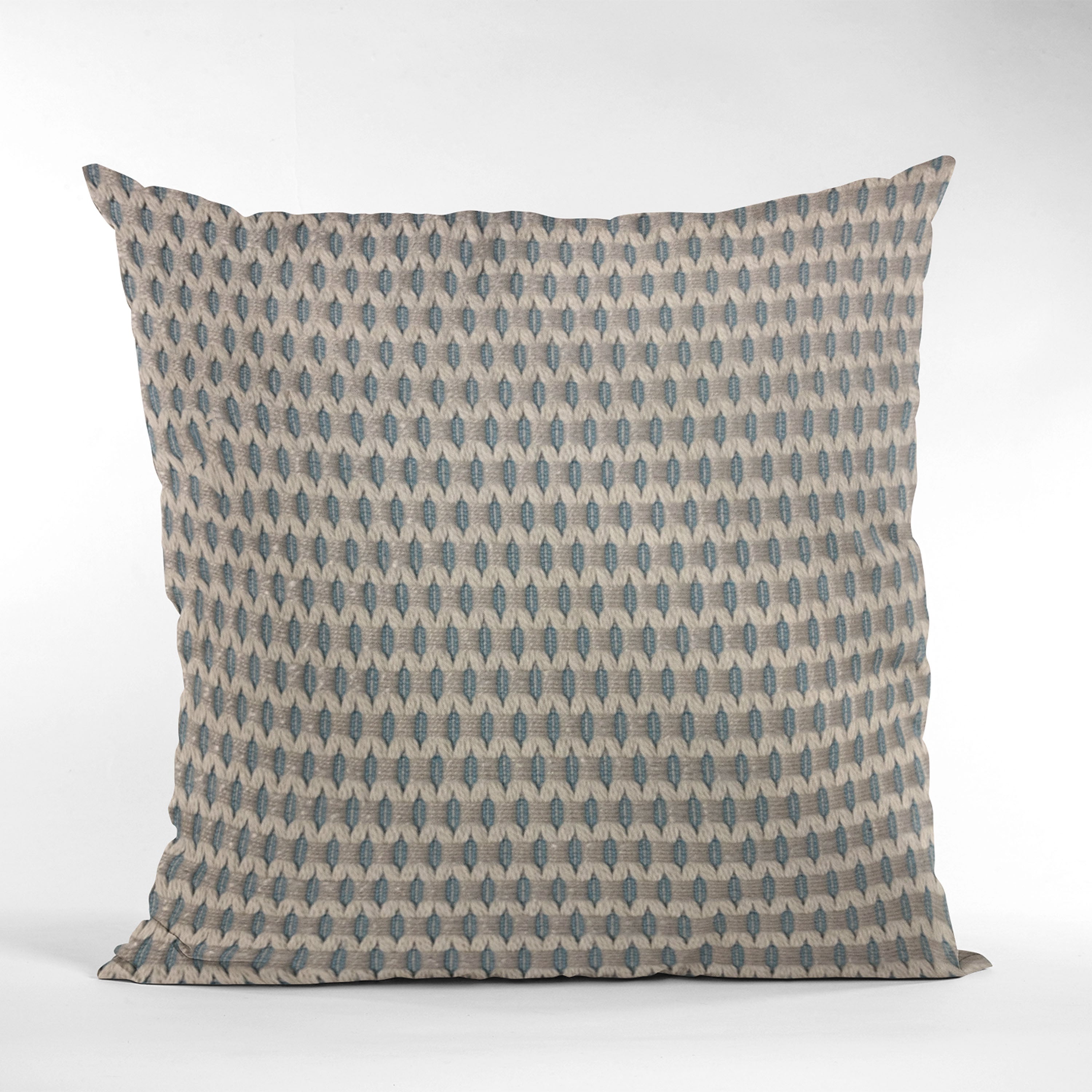 Plutus Blue Rocks Dot Luxury Throw Pillow featuring a trendy blue dot pattern, handmade in the USA with a hypoallergenic down alternative insert.