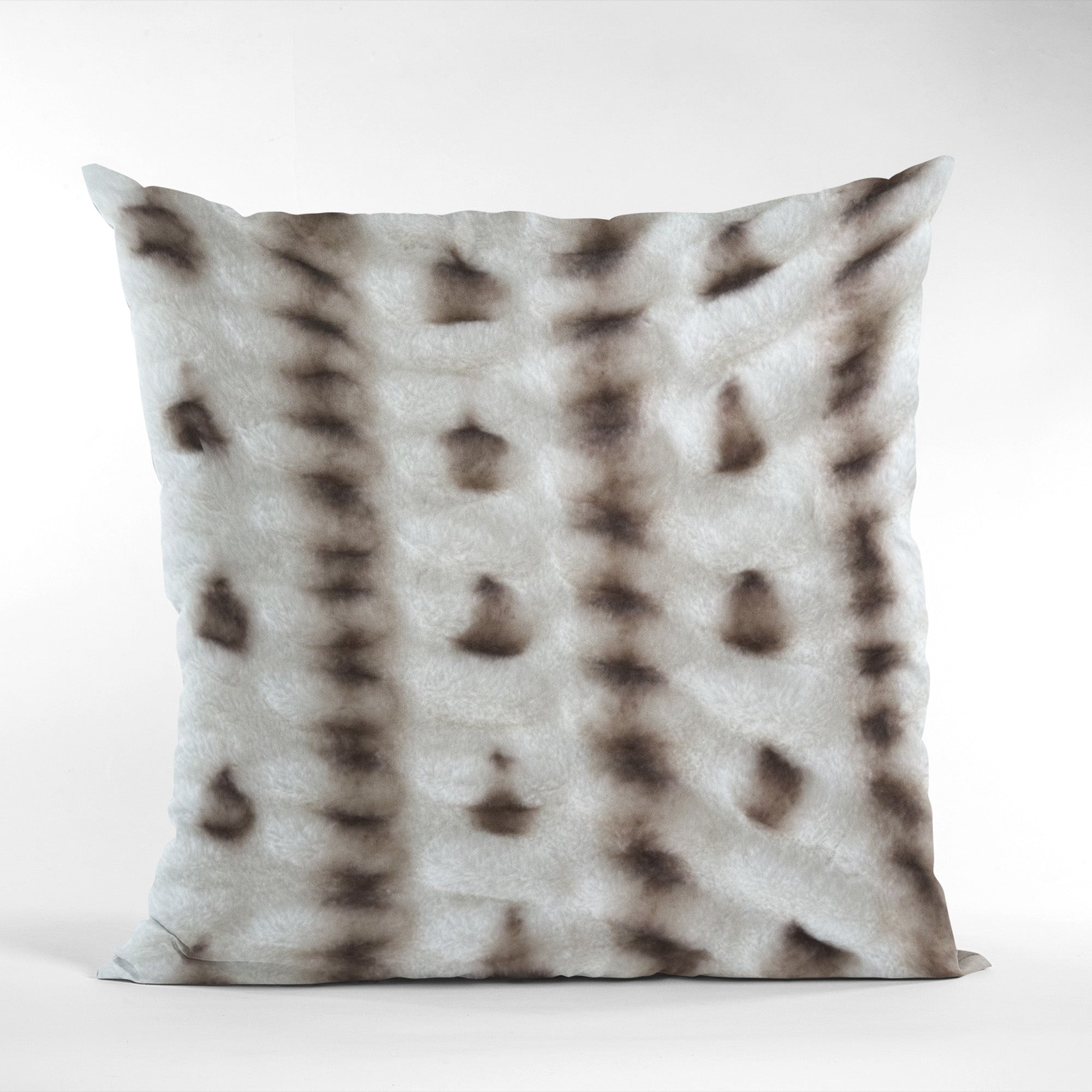 Plutus Creamy Fluffy Bunni Faux Fur Luxury Throw Pillow showcasing its soft texture and elegant design.