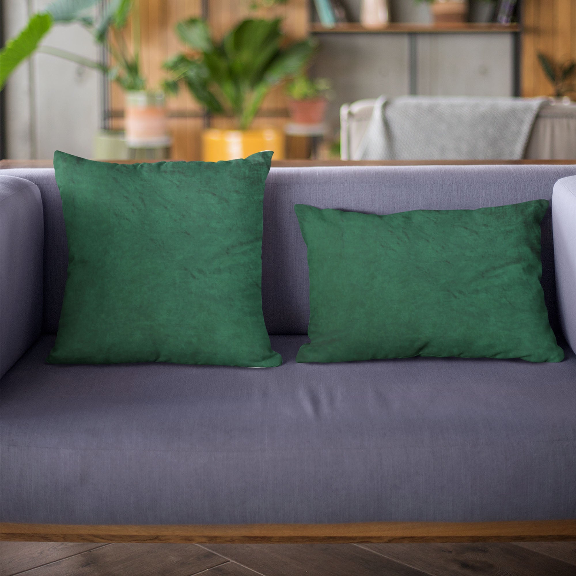 Plutus Emerald Lux Velvet Throw Pillow showcasing shiny emerald green velvet fabric with an invisible zipper and plush hypoallergenic insert.