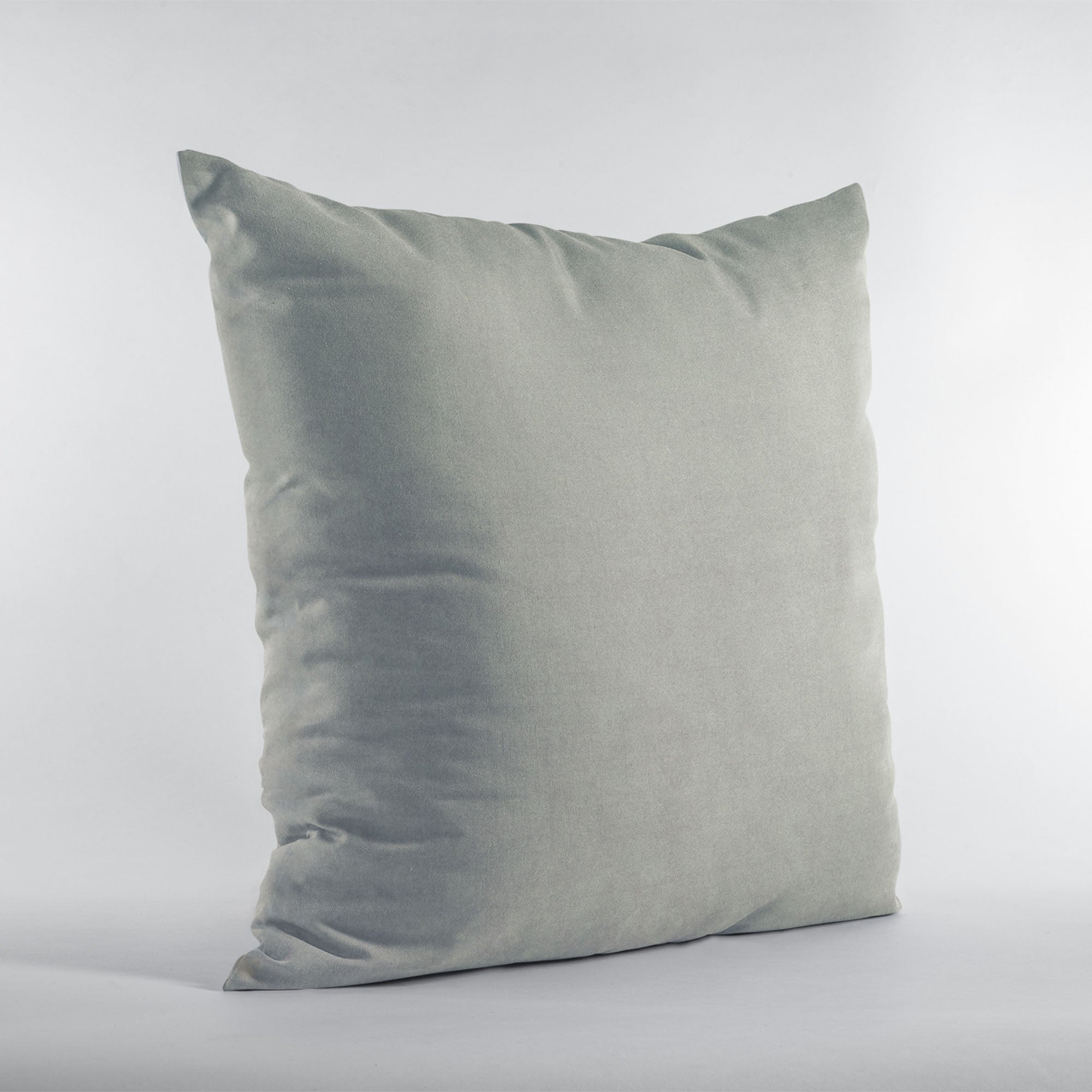 Plutus Grey Solid Shiny Velvet Luxury Throw Pillow showcasing its elegant shiny texture and invisible zipper design.