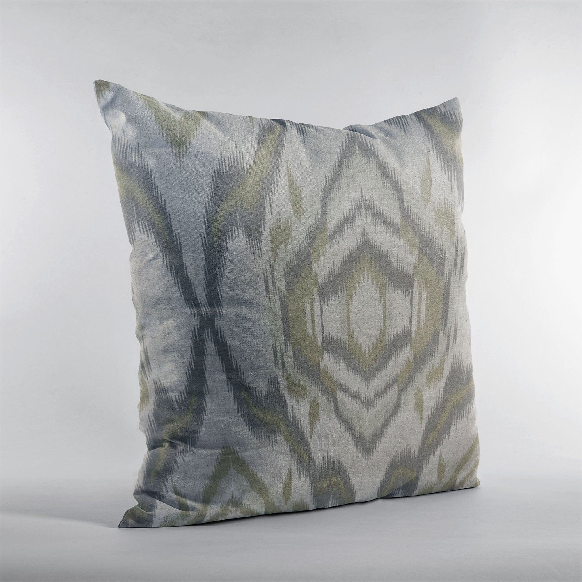 Plutus Ikat Dream Gray and Citrine Handmade Luxury Pillow showcasing a beautiful Ikat pattern with an invisible zipper enclosure.