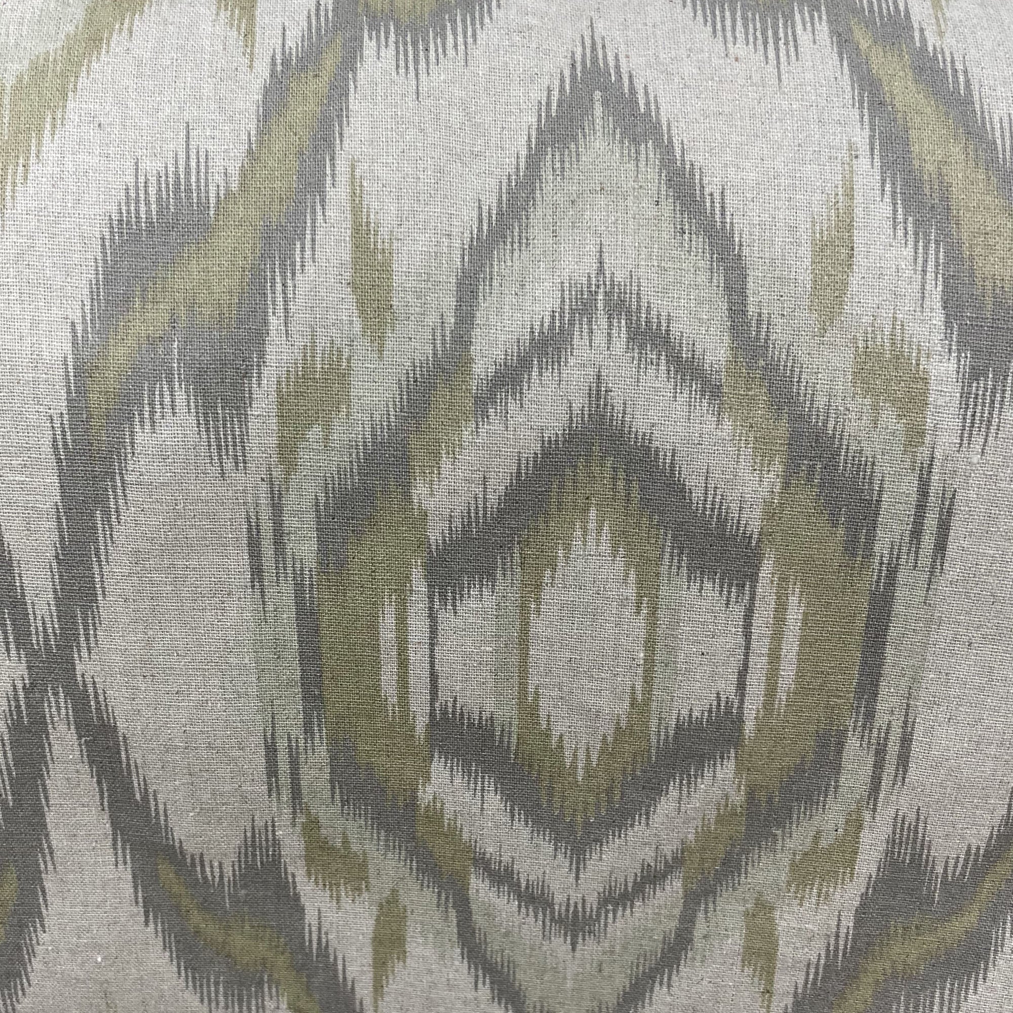 Plutus Ikat Dream Gray and Citrine Handmade Luxury Pillow showcasing a beautiful Ikat pattern with an invisible zipper enclosure.