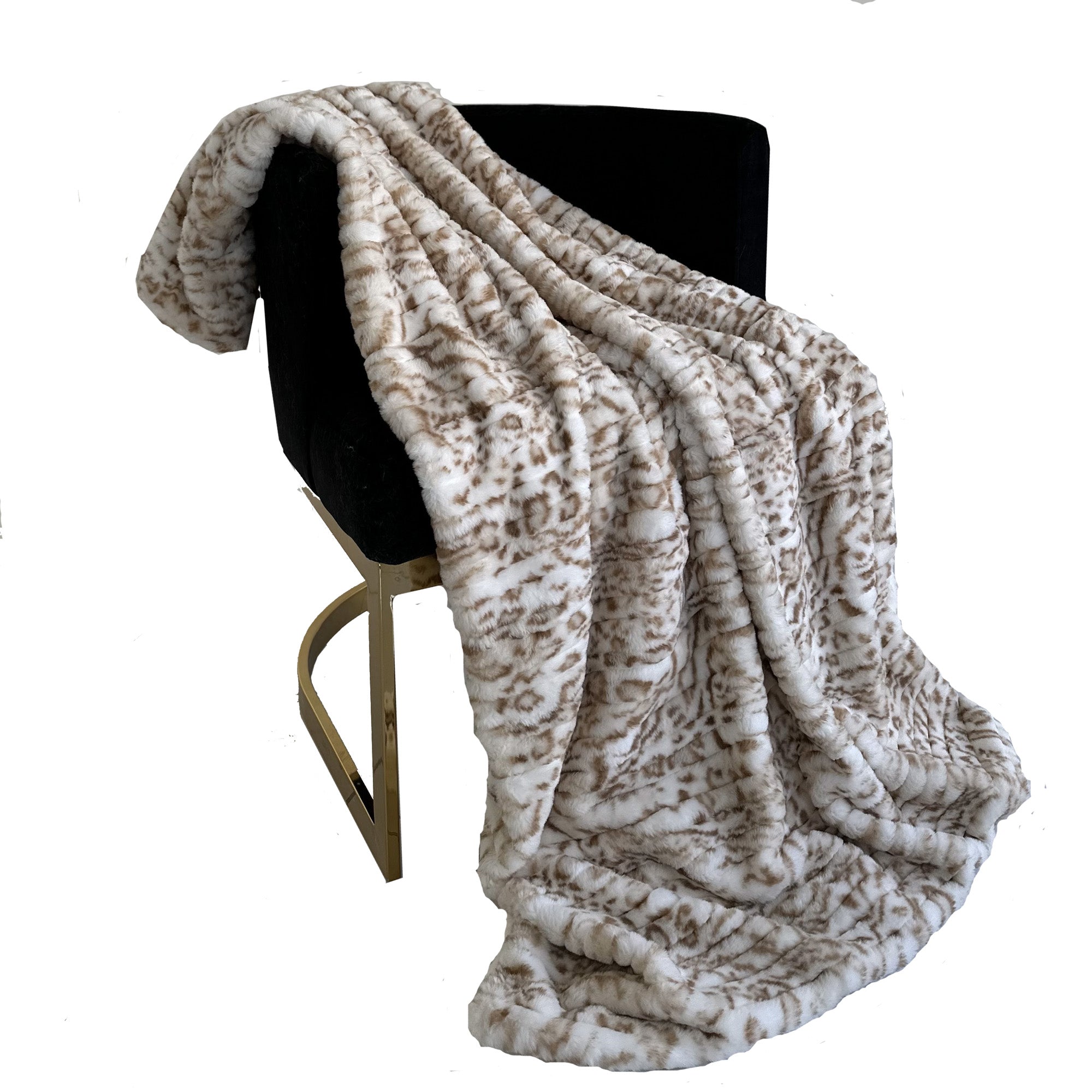 Plutus Light Brown Luxe Lash Faux Fur Luxury Throw Blanket draped elegantly over a couch, showcasing its soft texture and rich color.