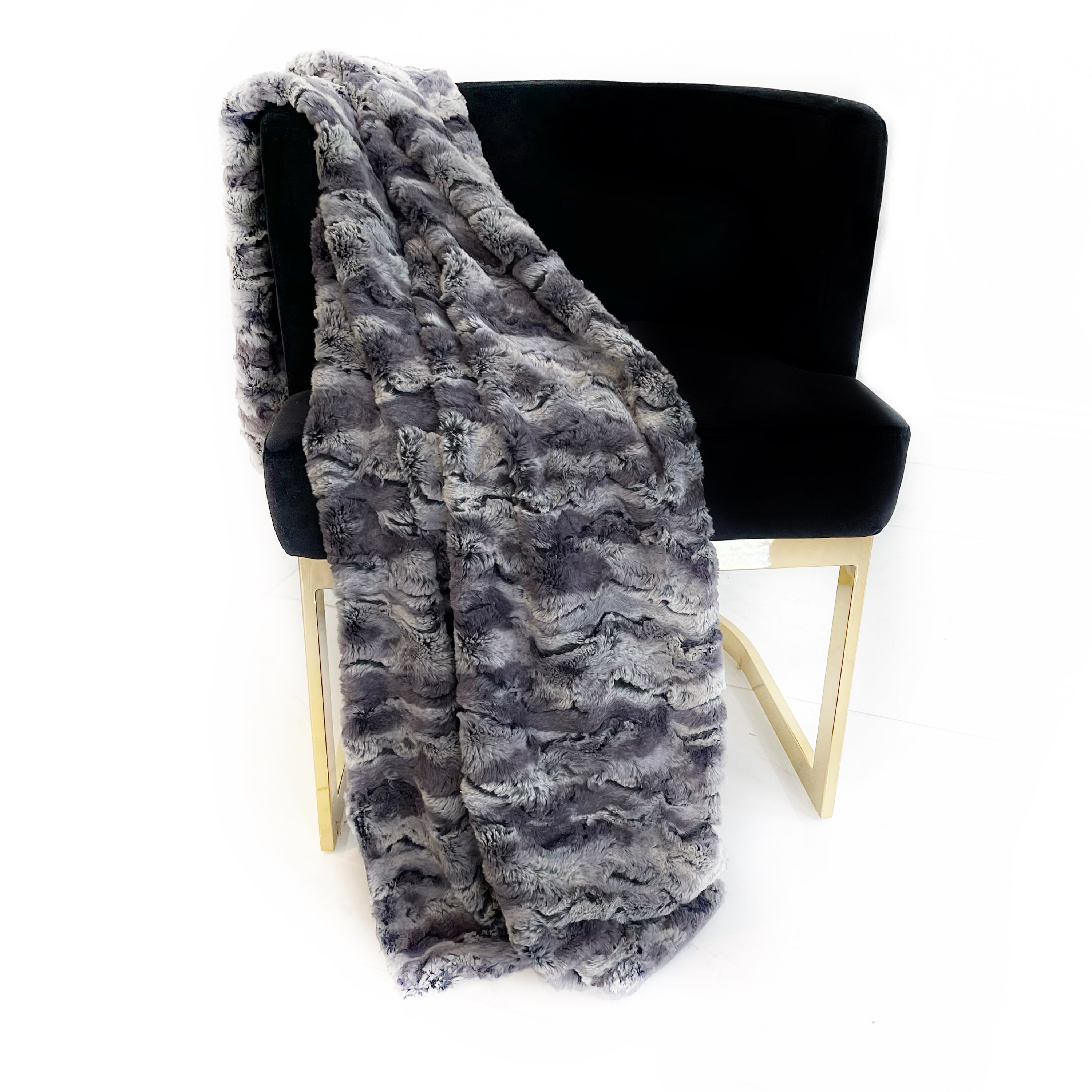 Plutus Metal Wild Rabbit Faux Fur Luxury Throw Blanket showcasing its plush texture and elegant metal color, perfect for home decor.