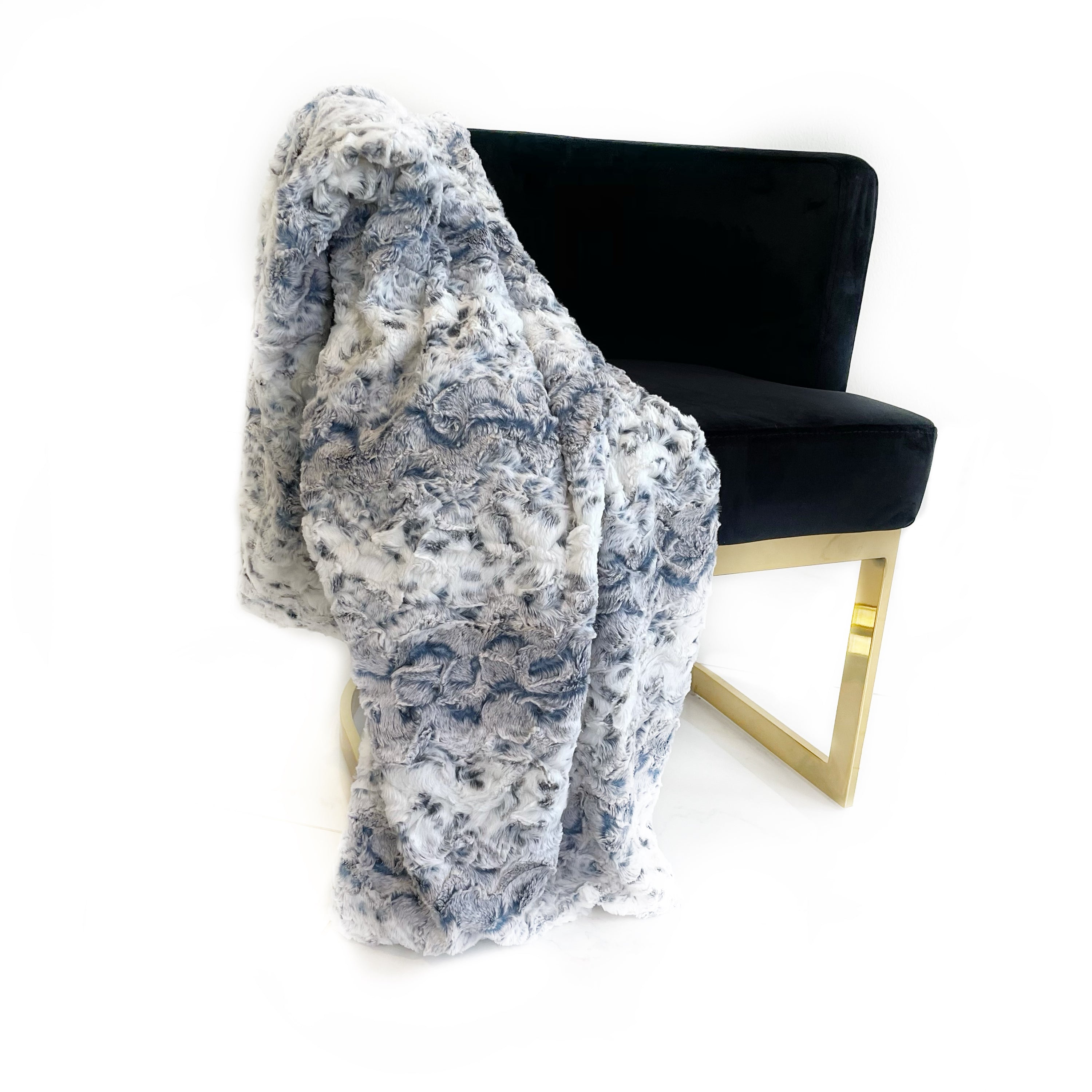 Plutus Navy Snowy Owl Faux Fur Luxury Throw Blanket showcasing its plush texture and reversible design in a stylish navy color.