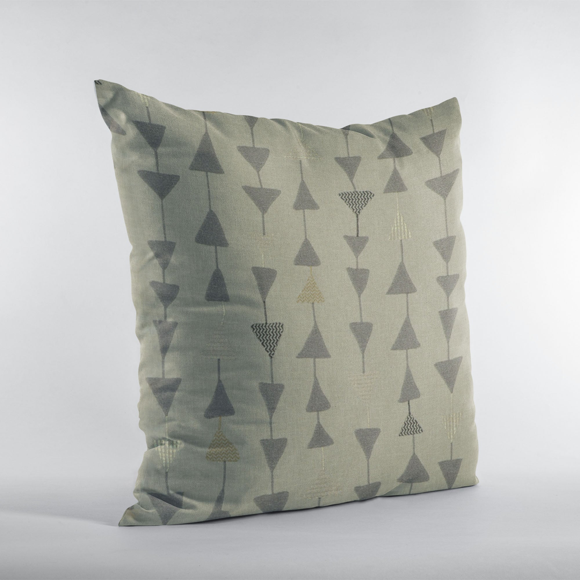 Plutus Pebble Manti Embroidery throw pillow featuring metallic triangle accents, showcasing luxurious fabric and elegant design.