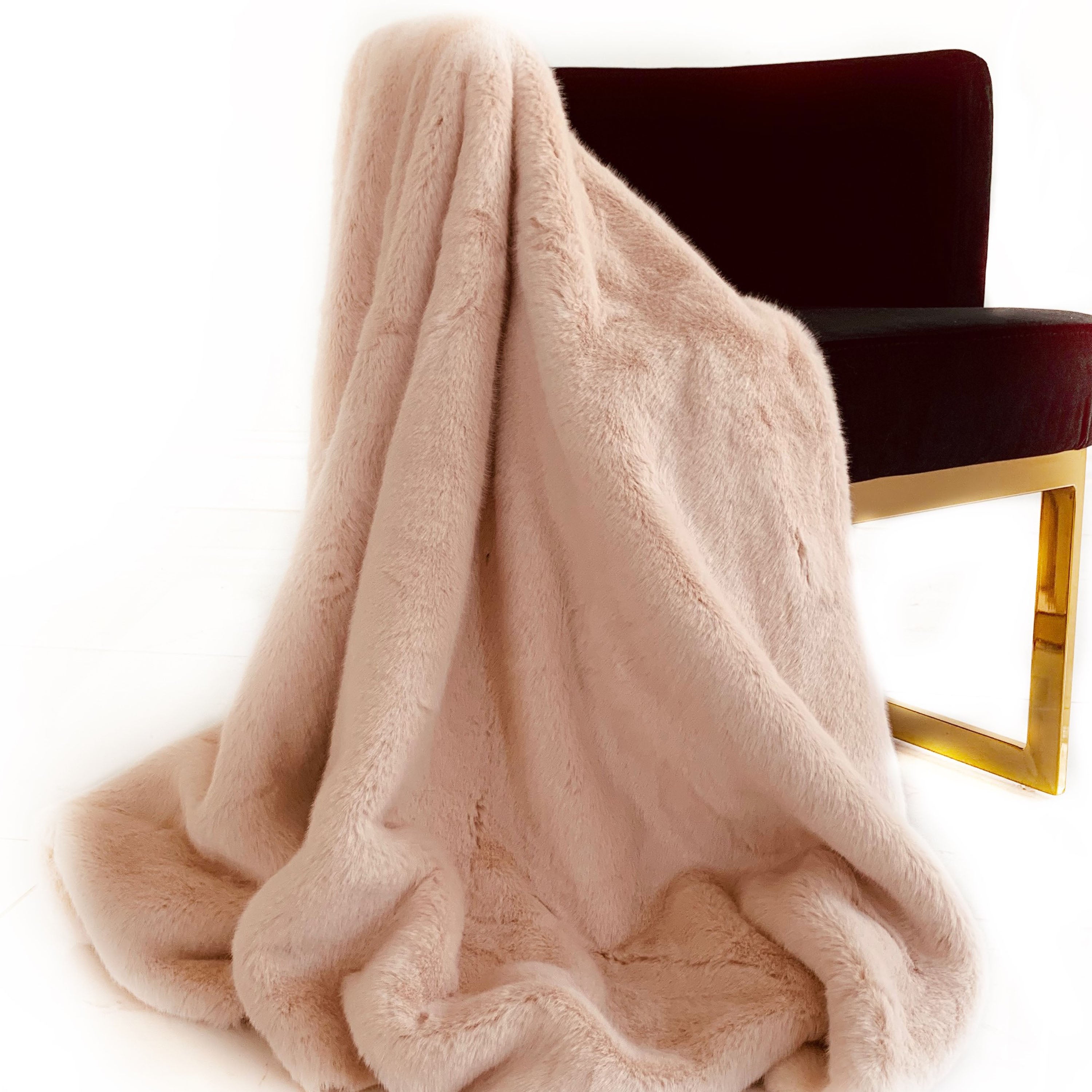 Plutus Pink Plush Faux Fur Luxury Throw Blanket in taupe and black, showcasing its soft texture and reversible design.