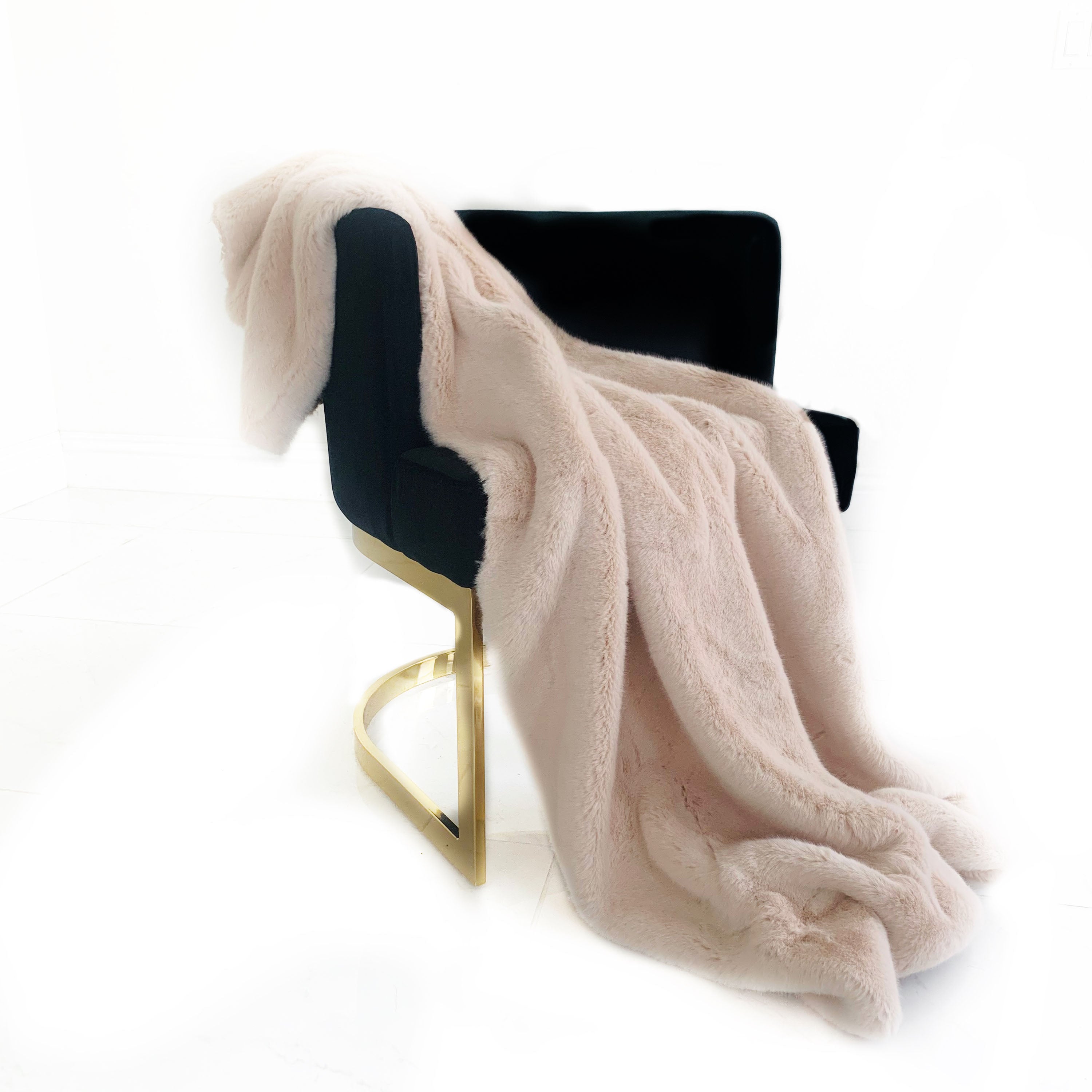 Plutus Pink Plush Faux Fur Luxury Throw Blanket in taupe and black, showcasing its soft texture and reversible design.