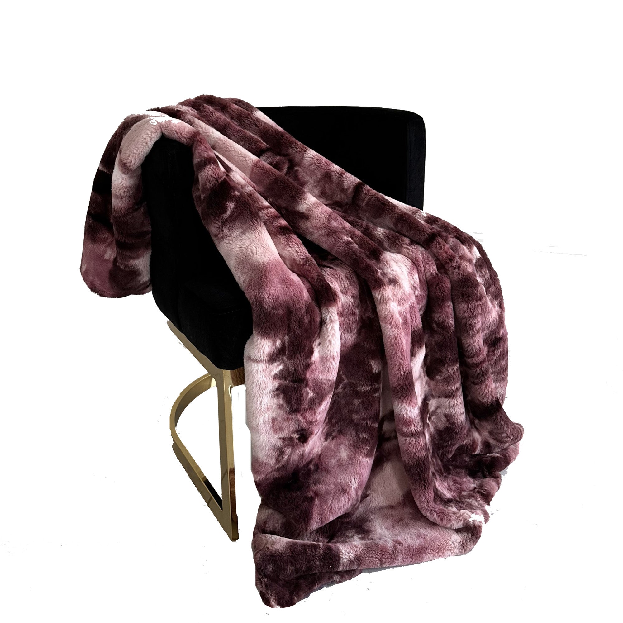 Plutus Rose Fureal Faux Fur Luxury Throw Blanket in elegant rose color, showcasing its soft texture and reversible design.