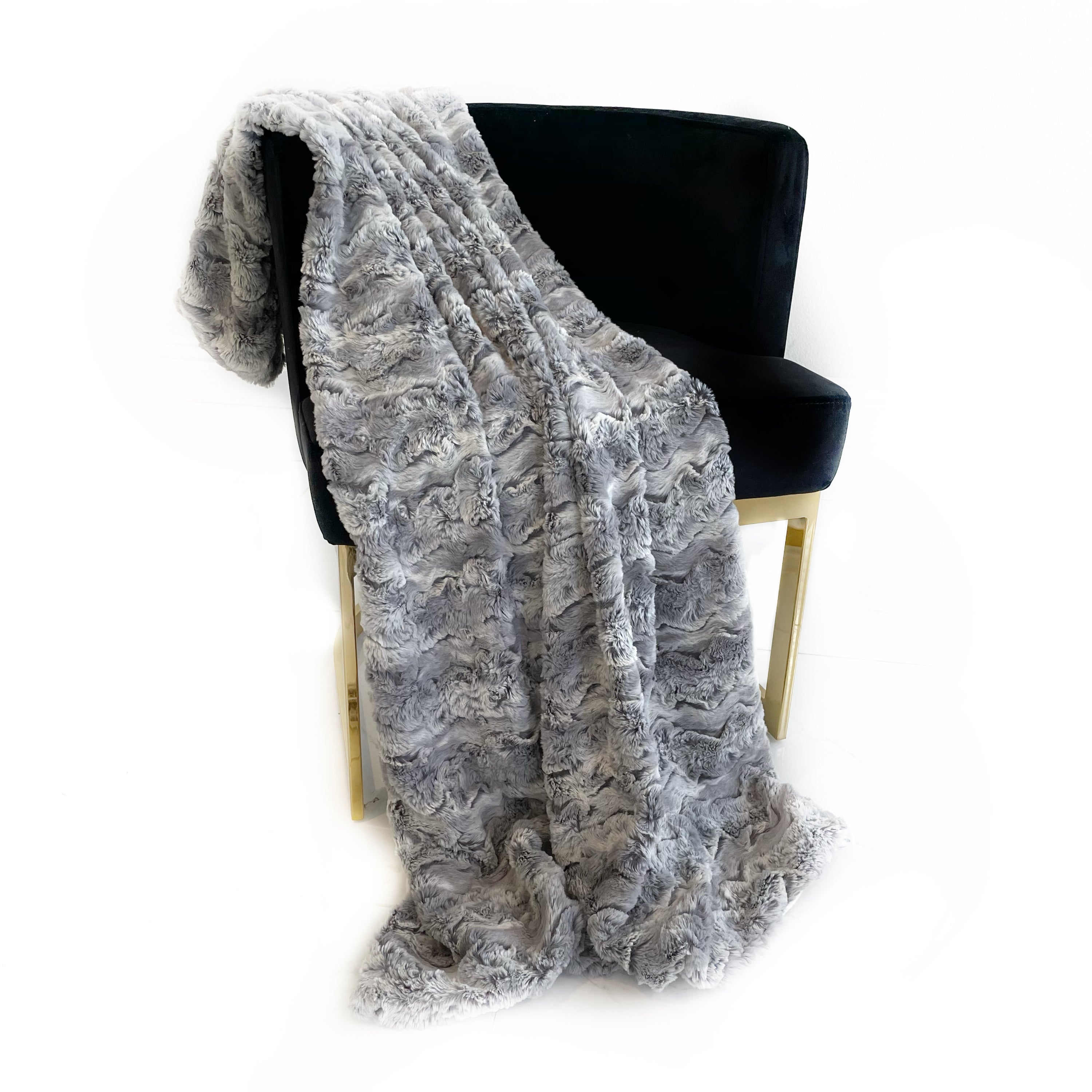 Plutus Silver Wild Rabbit Faux Fur Luxury Throw Blanket showcasing its soft texture and elegant silver color, perfect for stylish home decor.