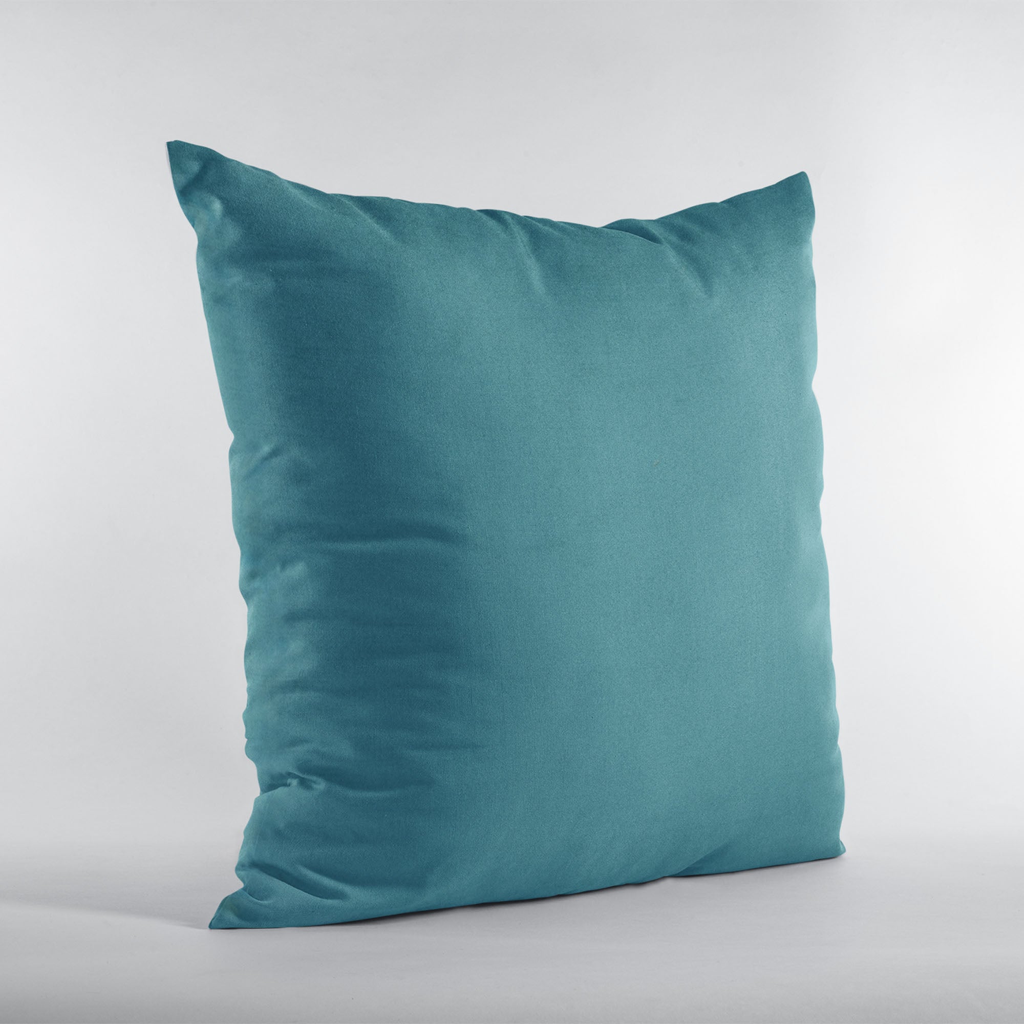 Plutus Sky Blue Solid Shiny Velvet Luxury Throw Pillow showcasing its elegant shiny texture and vibrant color, perfect for home decor.