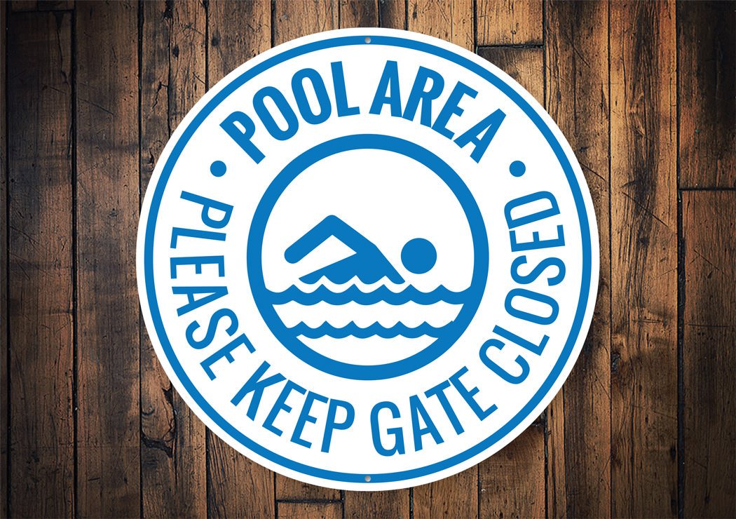 Customizable Pool Area Gate Sign made of durable aluminum, featuring pre-drilled holes for easy mounting.