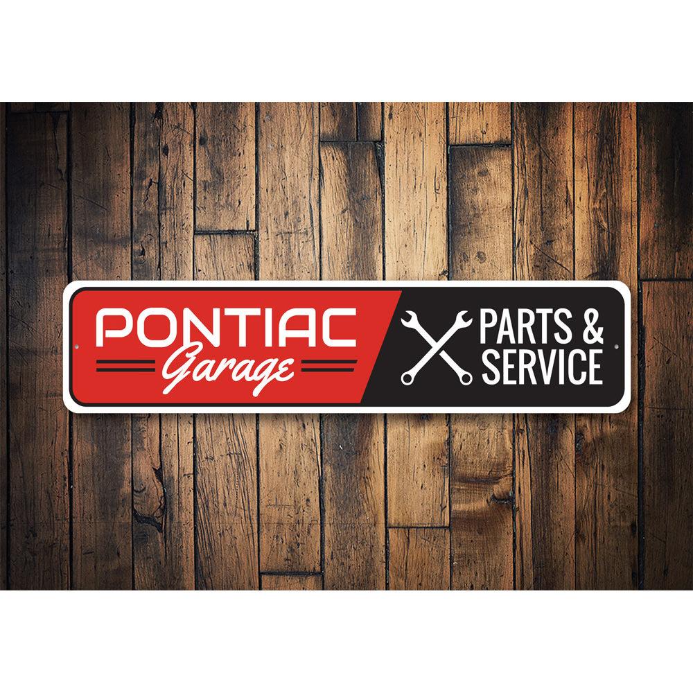 Pontiac Garage Sign made of high-quality aluminum, featuring vibrant colors and customizable text options, perfect for car enthusiasts.