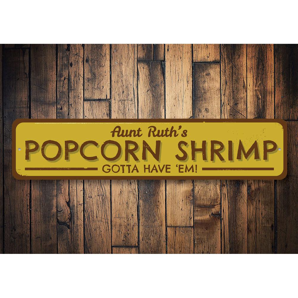 A vibrant Popcorn Shrimp Sign made of aluminum, featuring a beach-themed design, perfect for coastal decor.