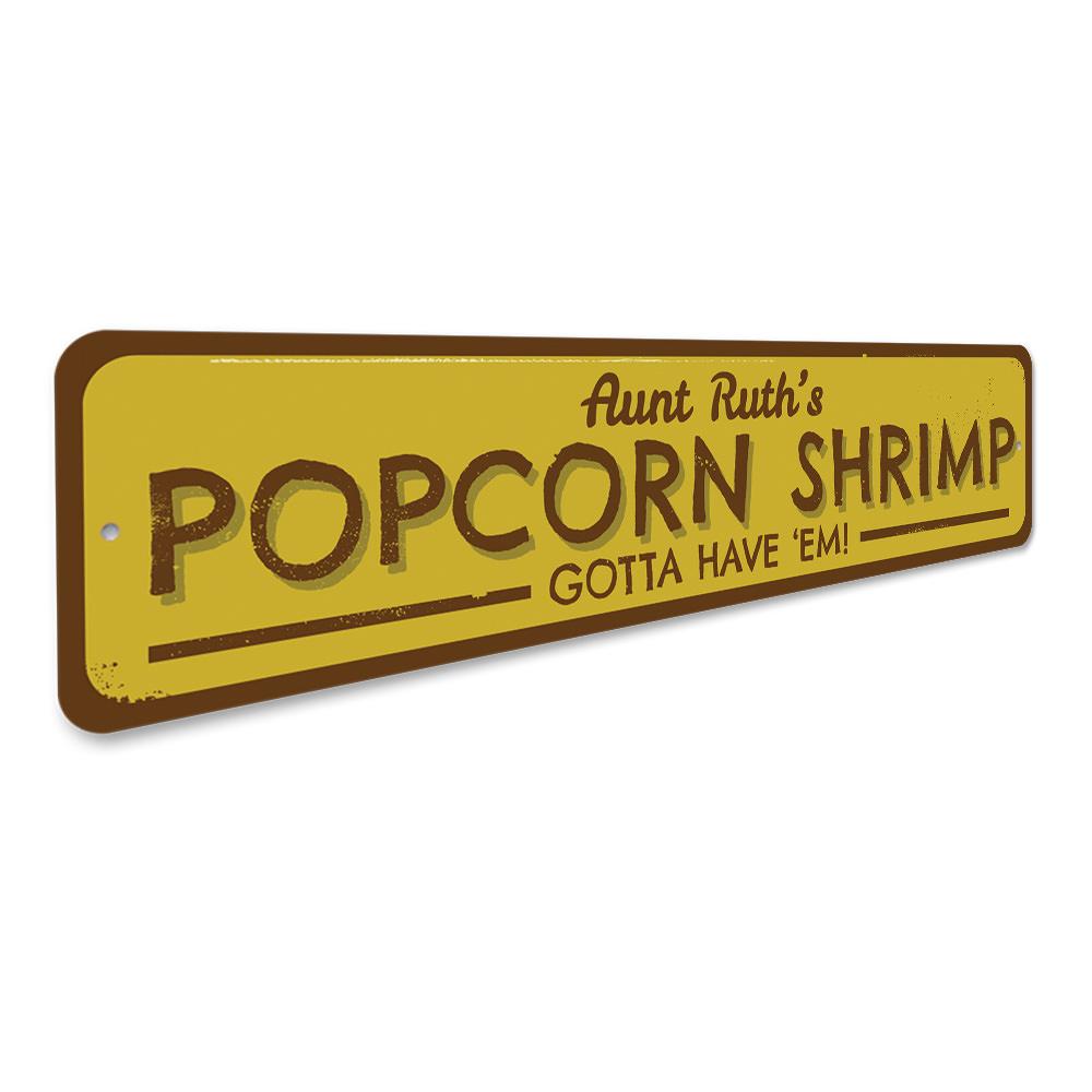 A vibrant Popcorn Shrimp Sign made of aluminum, featuring a beach-themed design, perfect for coastal decor.