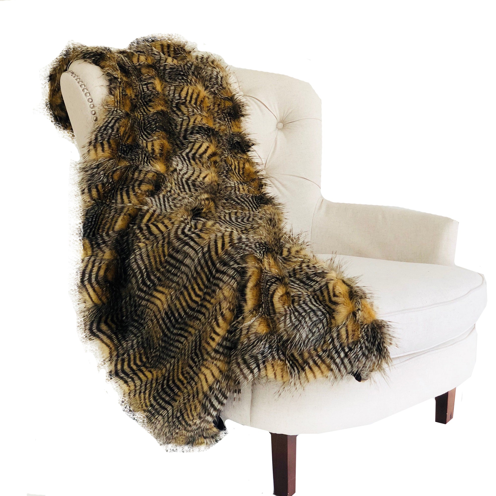 Porcupine Mocha Faux Fur Luxury Throw showcasing rich brown and grey tones, draped elegantly on a sofa.