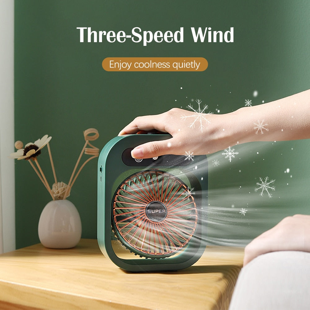 Portable Mist Fan in white color with water bottle and USB charging cable, designed for cooling and humidifying air.