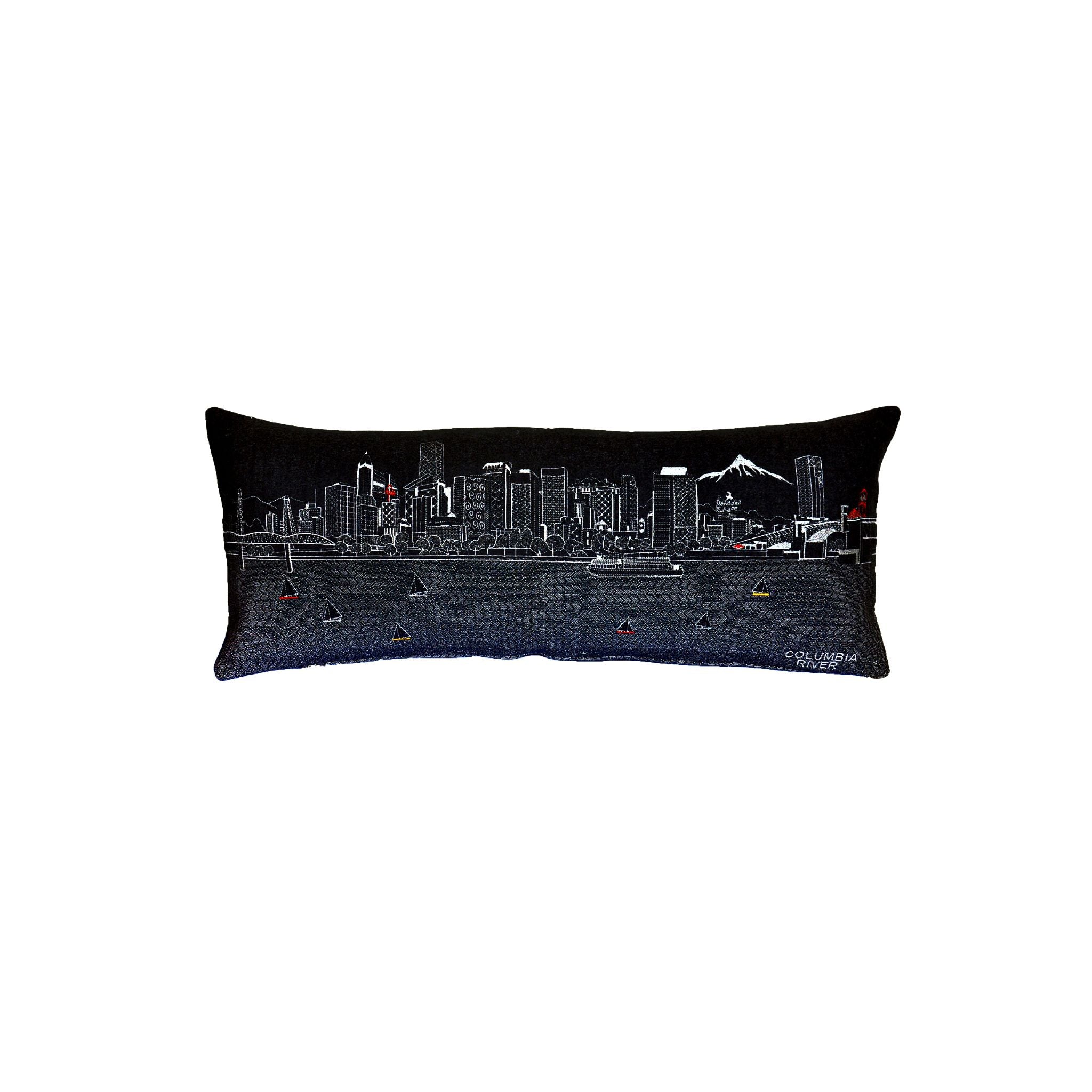 Portland Pillow featuring embroidered designs of iconic Portland landmarks and bridges, with a red zipper at the bottom.