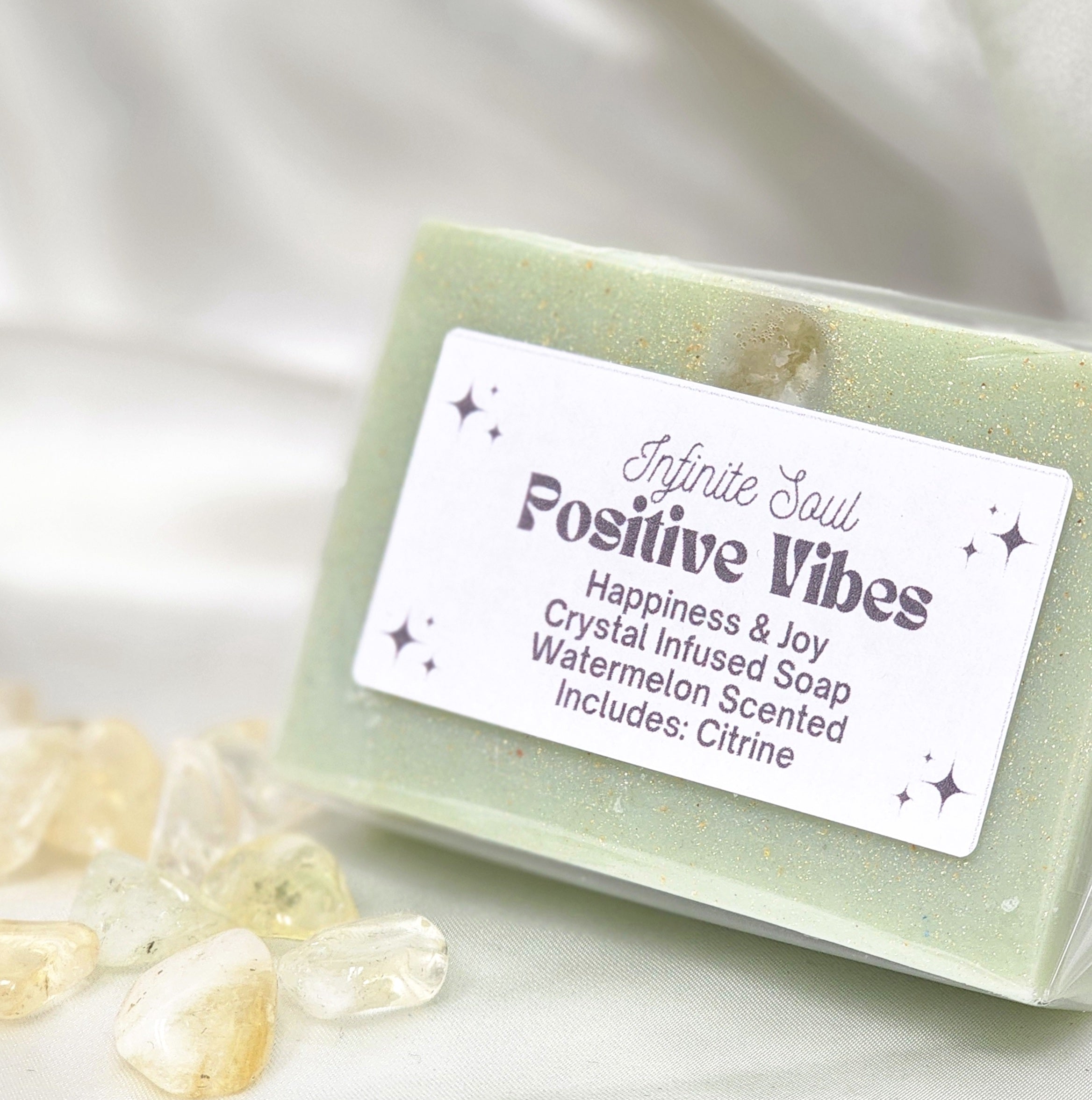 Positive Vibes Crystal Infused Soap with Citrine stone, showcasing its vibrant color and natural ingredients.