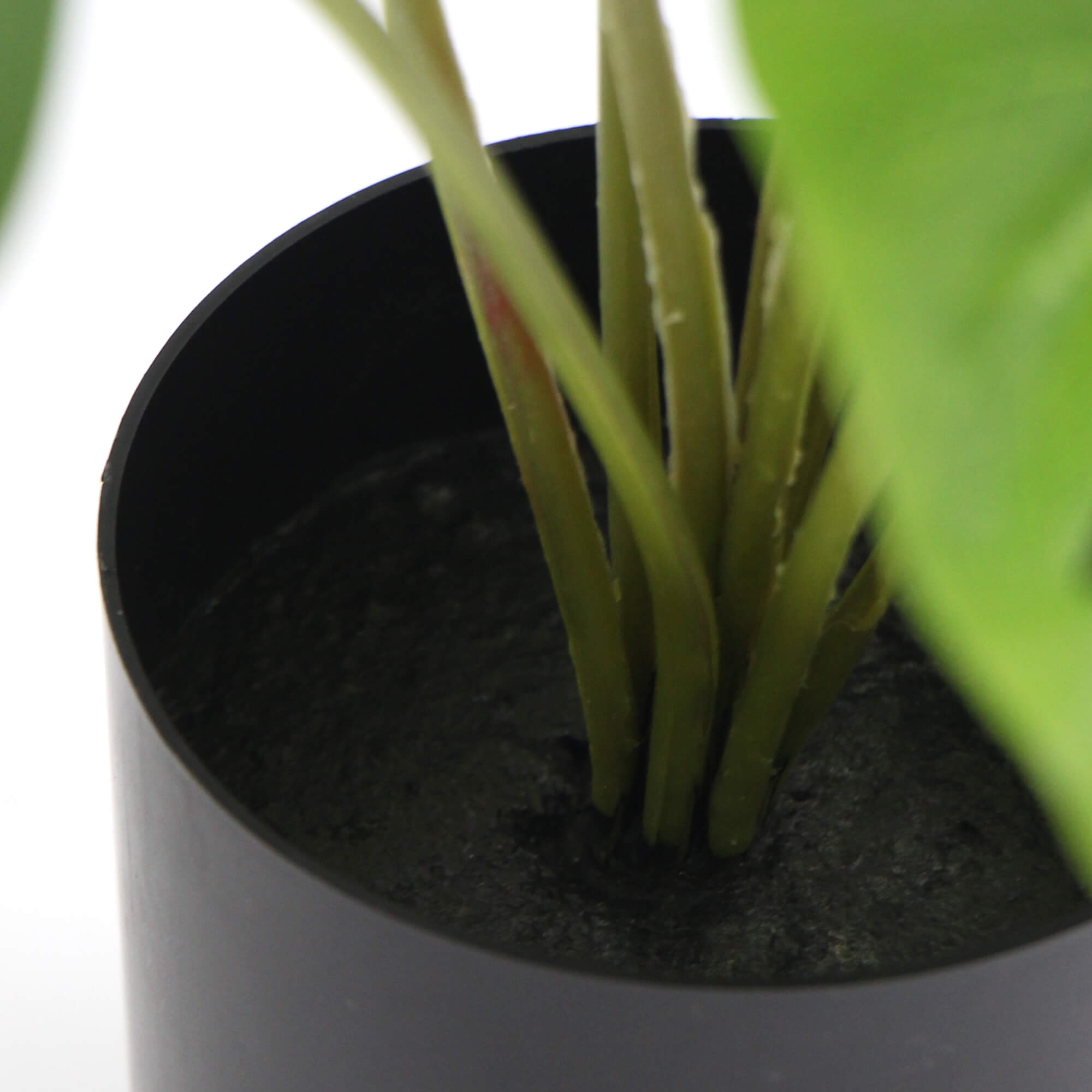 Potted Artificial Split Philodendron Plant with realistic leaves in a stylish white pot, measuring 40cm tall.