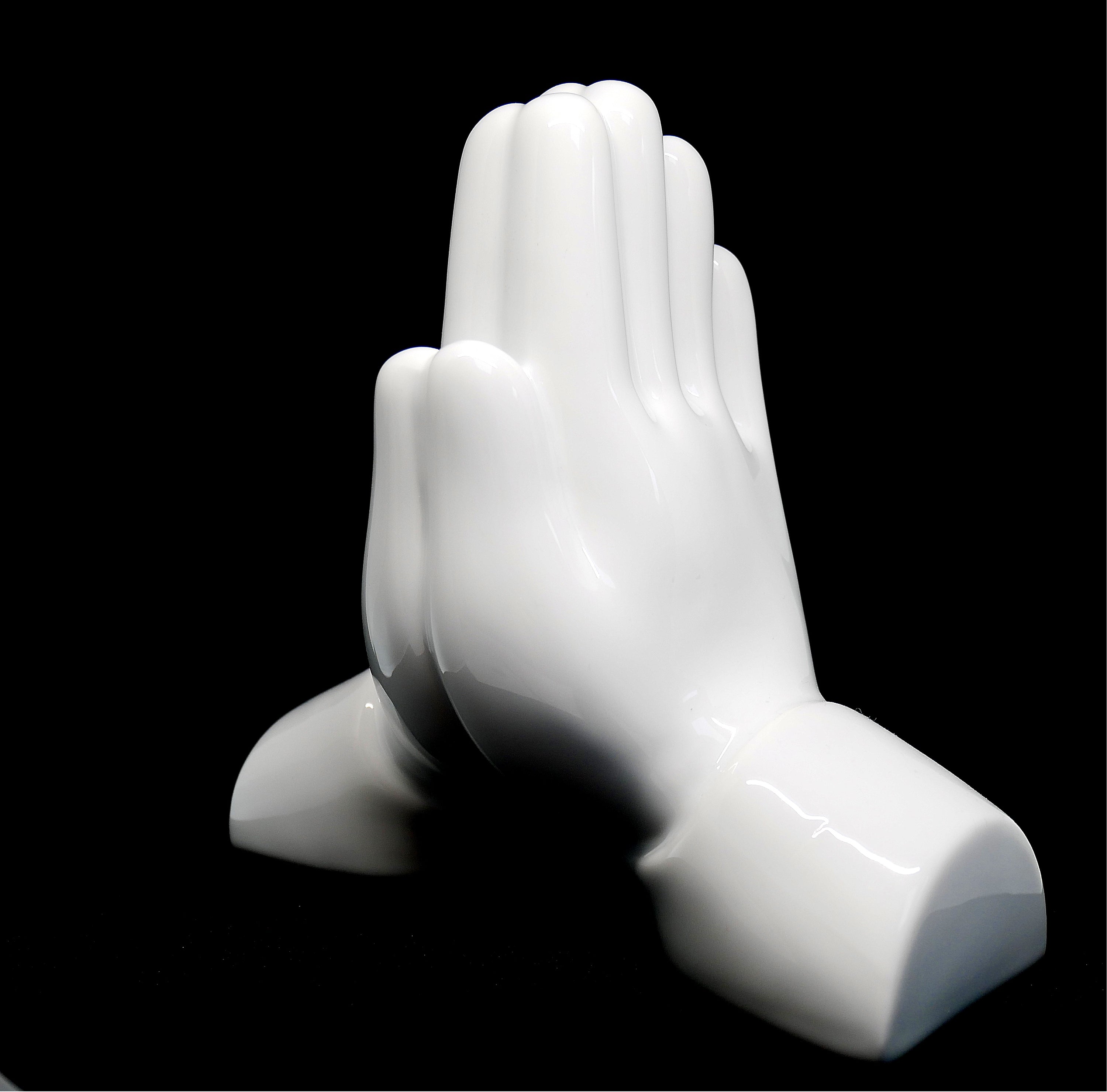 Pray Hands Porcelain sculpture by Matthew Lapenta, crafted from extra white porcelain with a black finish, symbolizing respect and gratitude.