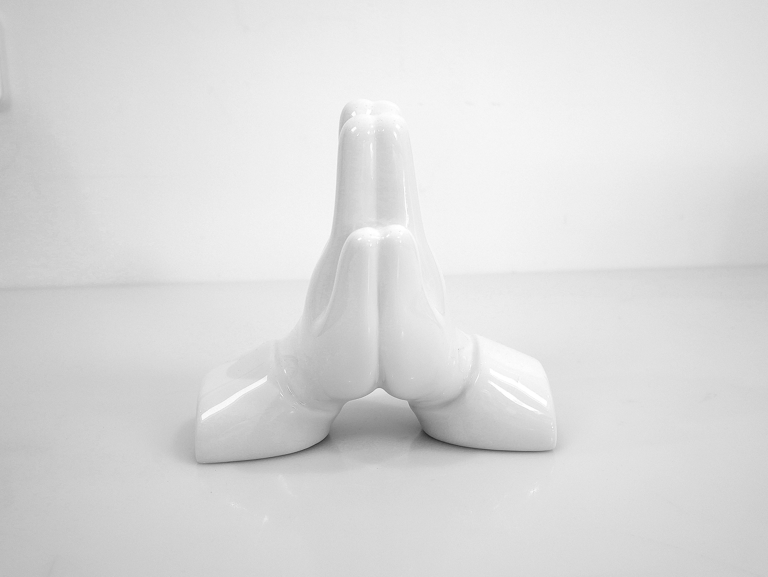 Pray Hands Porcelain sculpture by Matthew Lapenta, crafted from extra white porcelain with a black finish, symbolizing respect and gratitude.