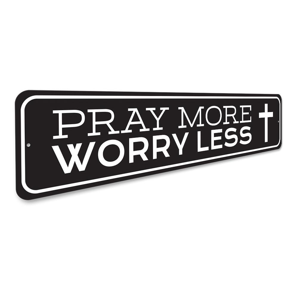 A decorative Pray More Worry Less sign made of durable aluminum, featuring a stylish design suitable for home decor.