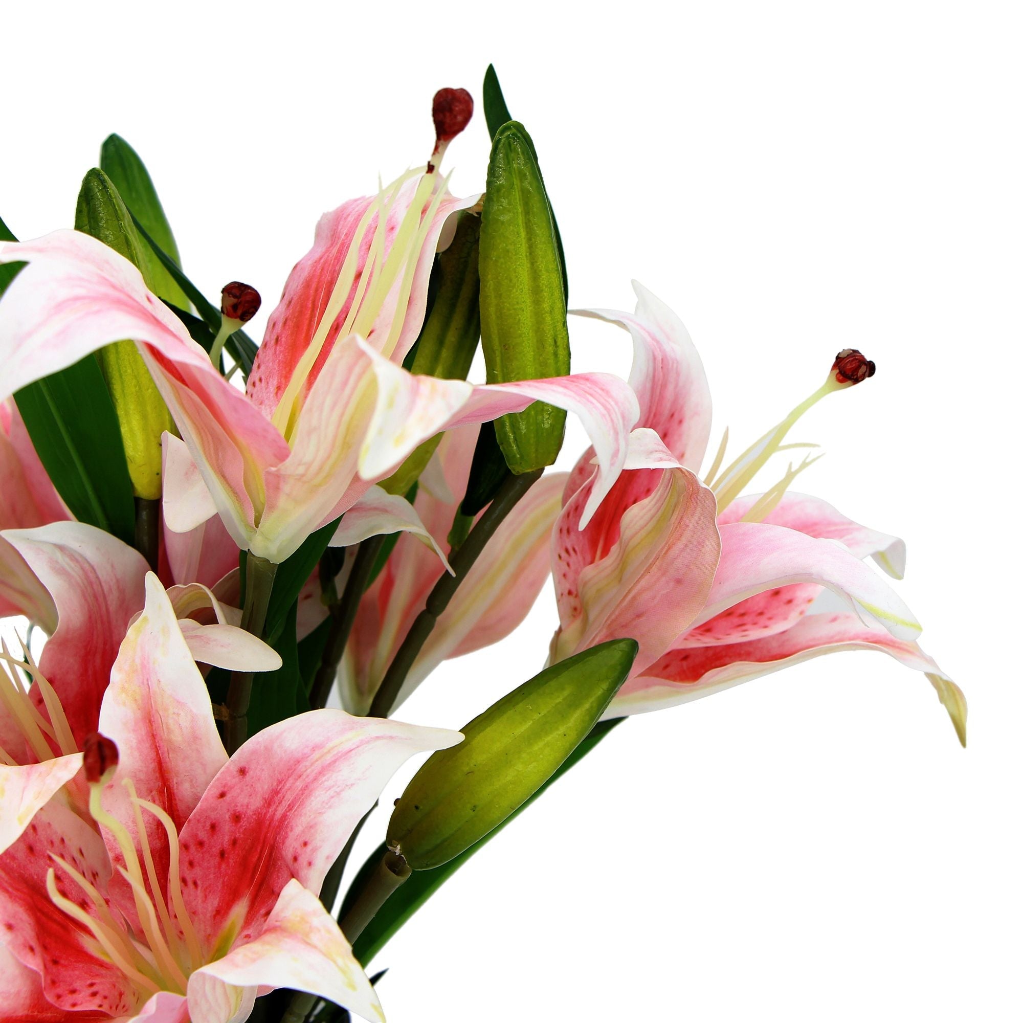 A beautiful arrangement of premium faux pink lilies in a clear glass vase, showcasing realistic flowers and foliage.